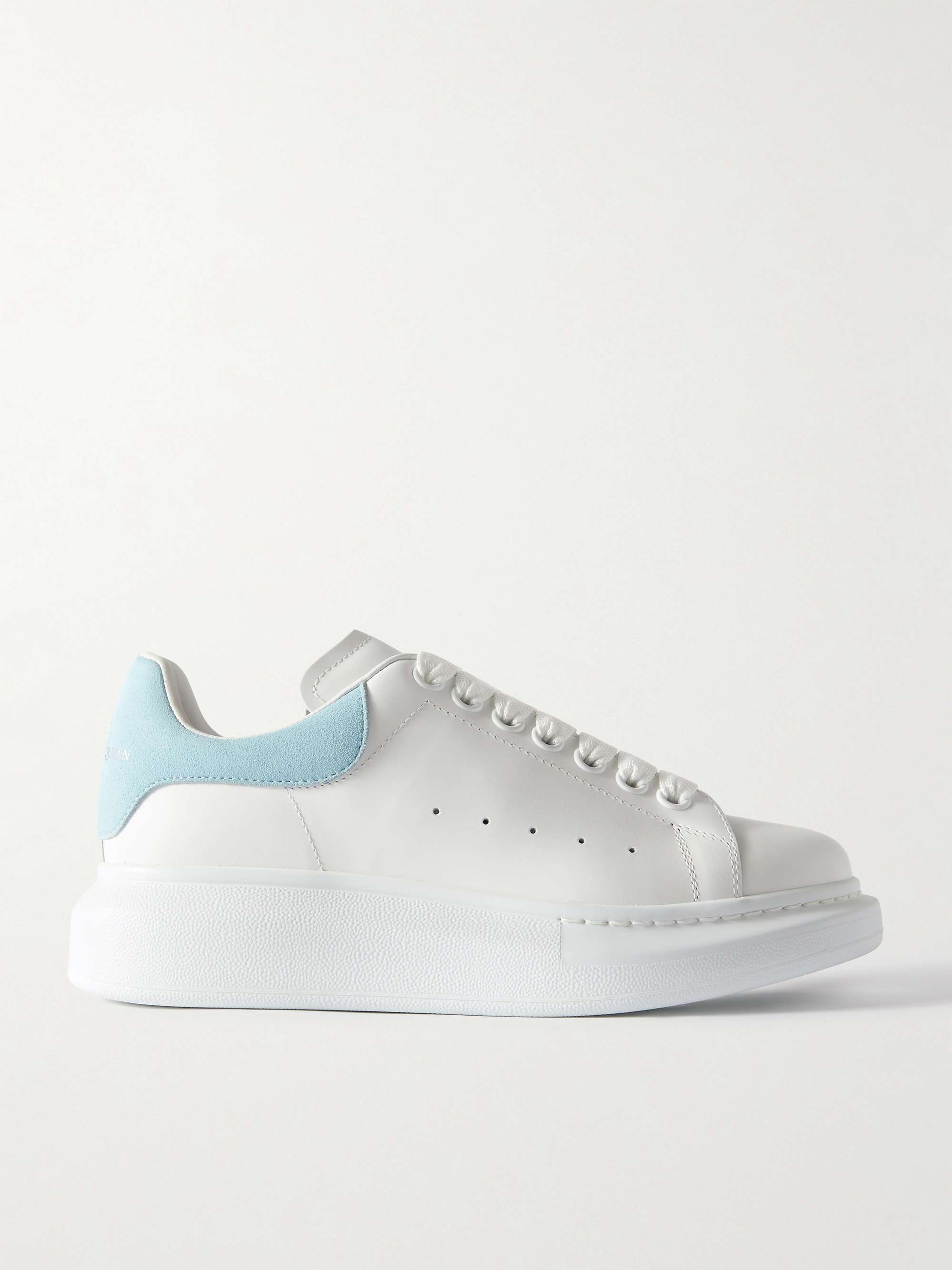 Sneakers aus Leder mit Velourslederbesatz und uberstehender Sohle weiB IT34.5