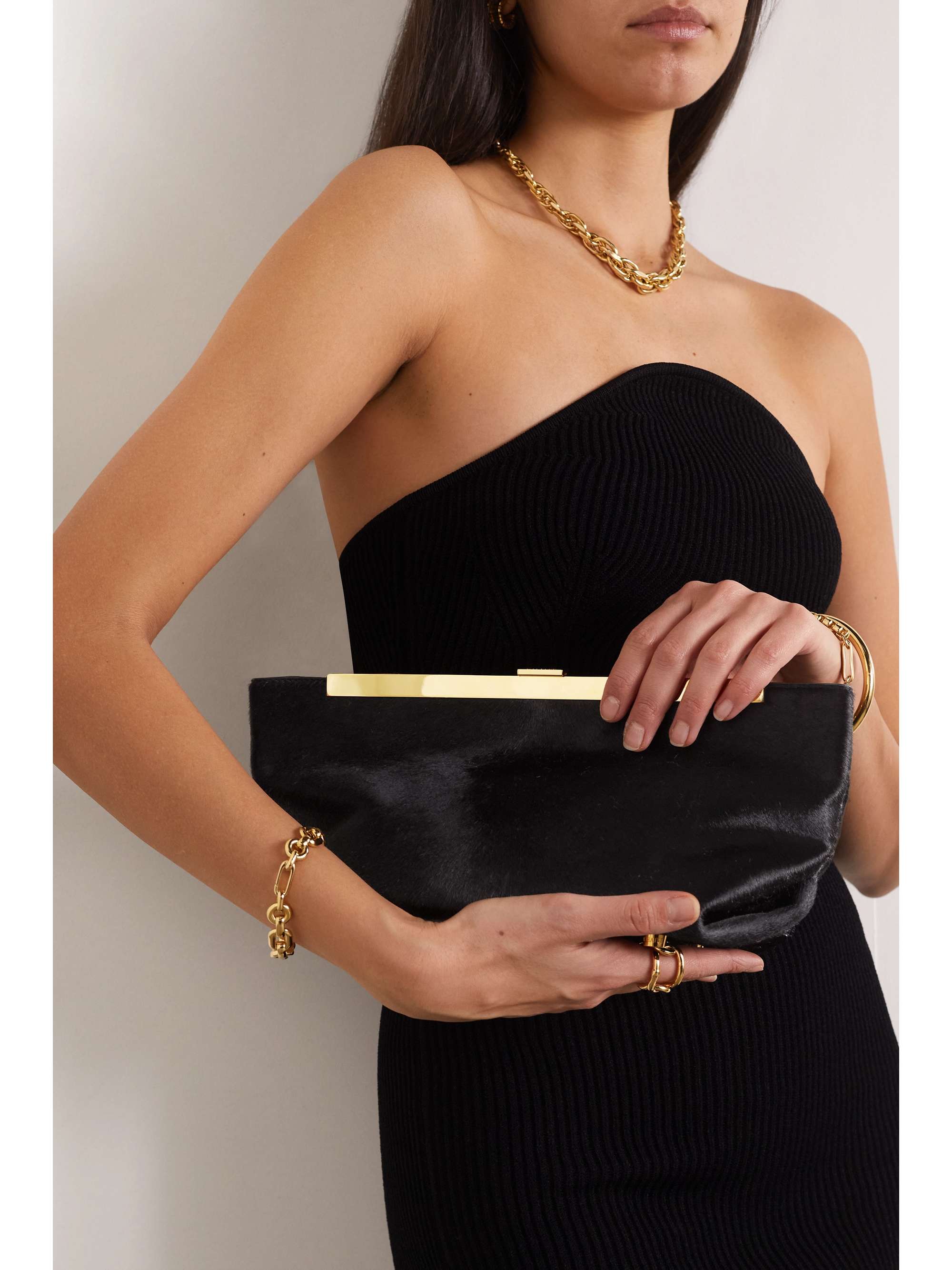 KHAITE Aimee calf hair clutch NETAPORTER