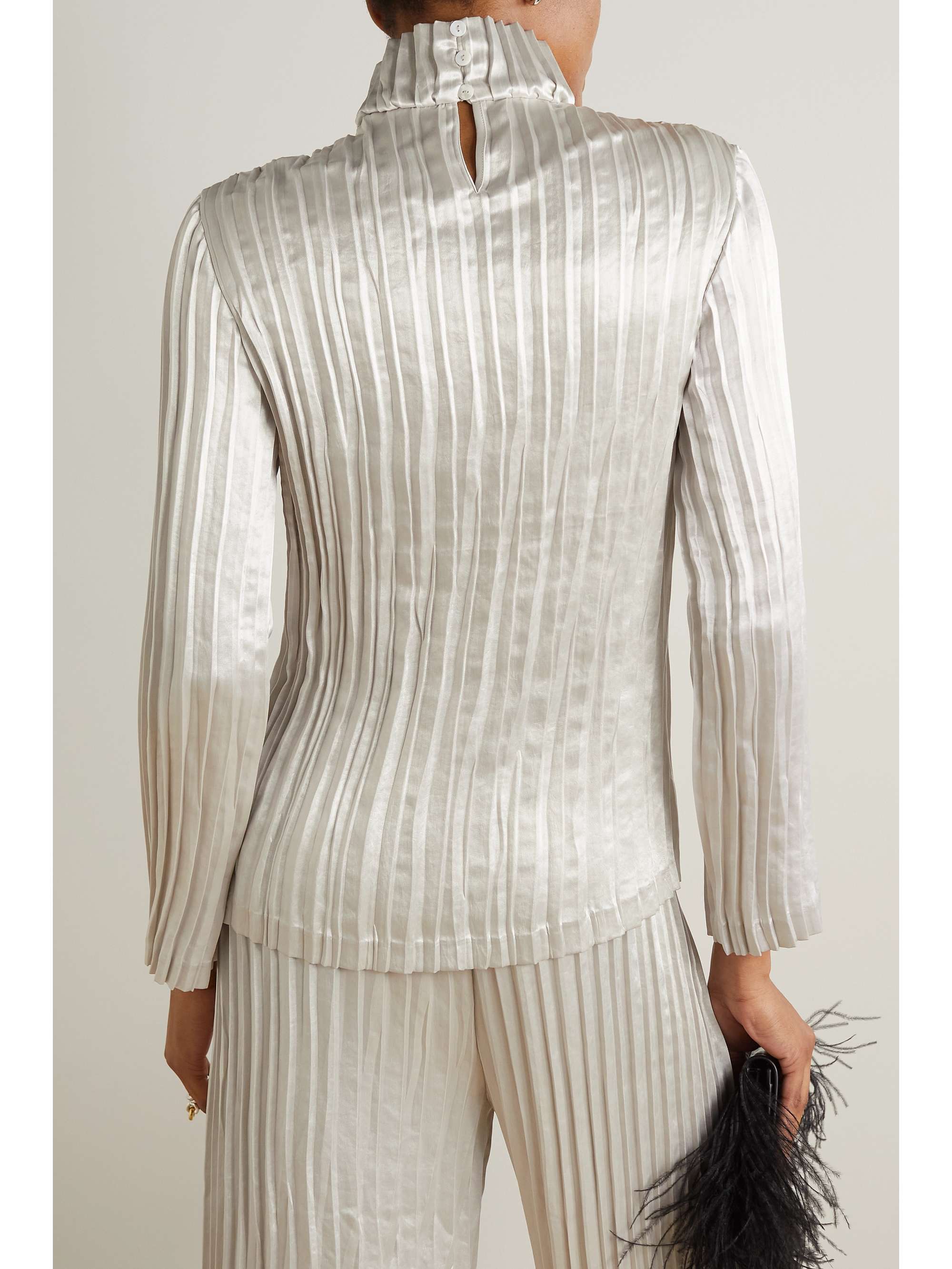 INTERIOR The Twiggy pleated satin turtleneck top