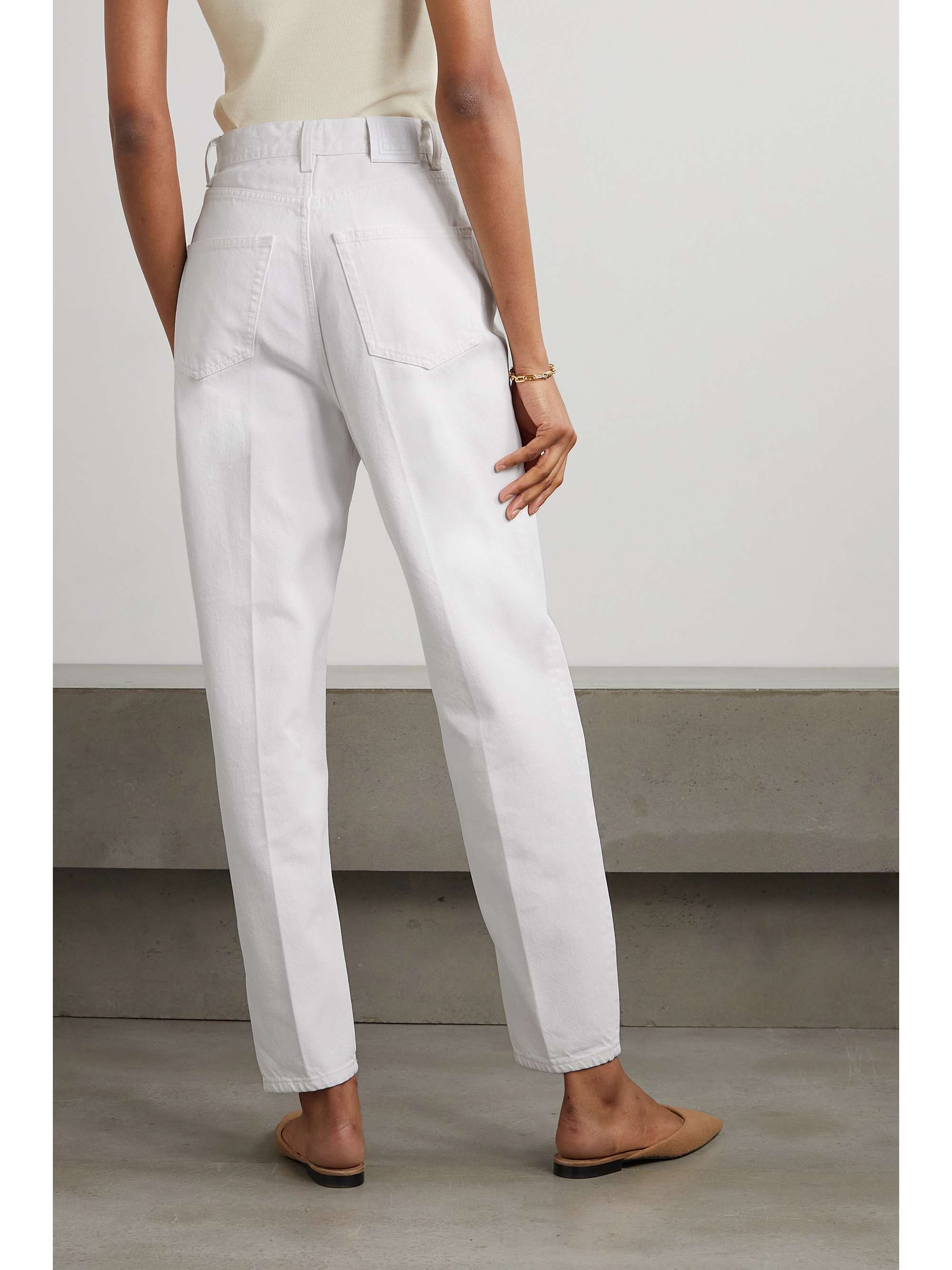 TOTEME High-rise tapered jeans