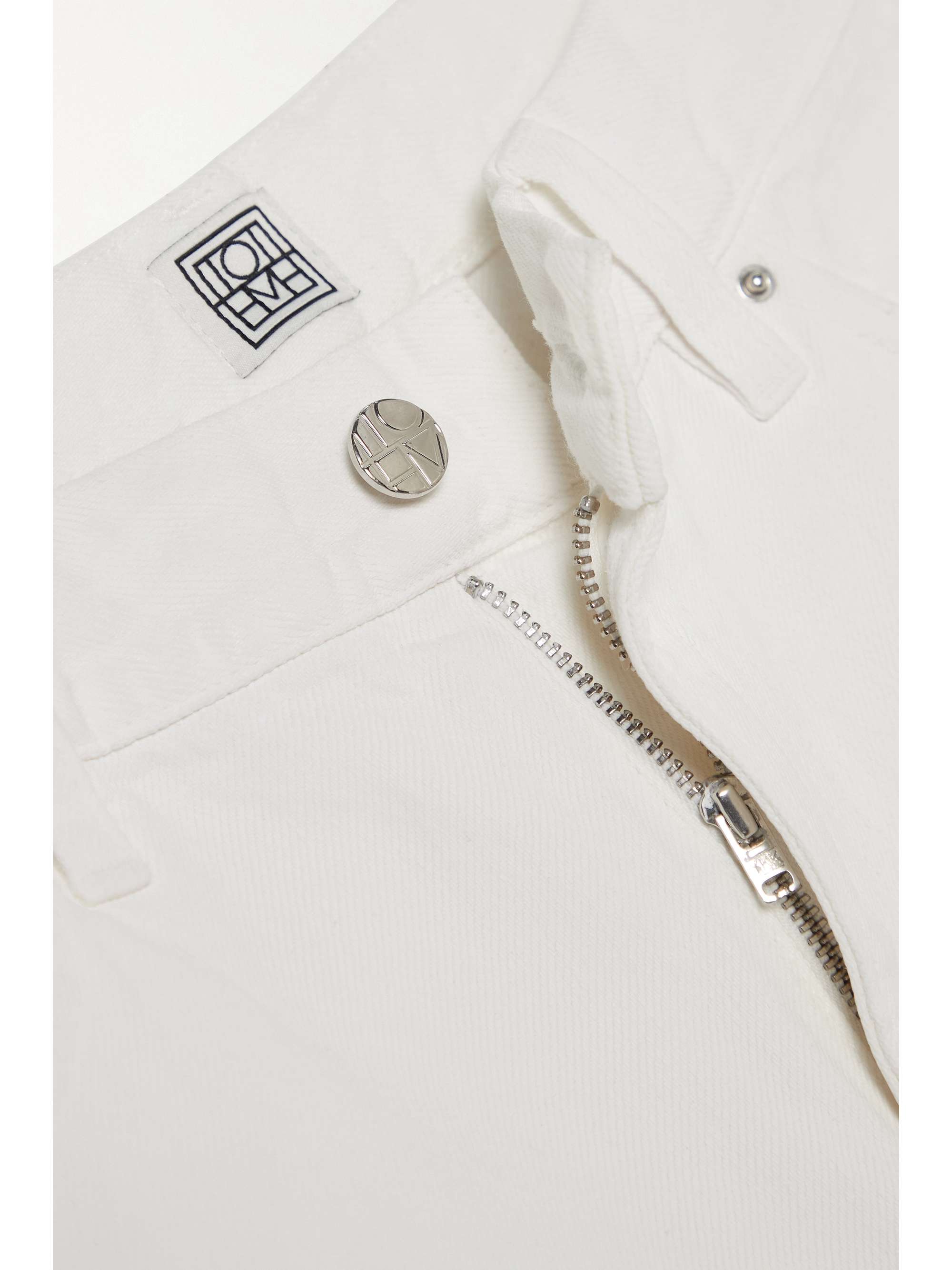 TOTEME High-rise tapered jeans