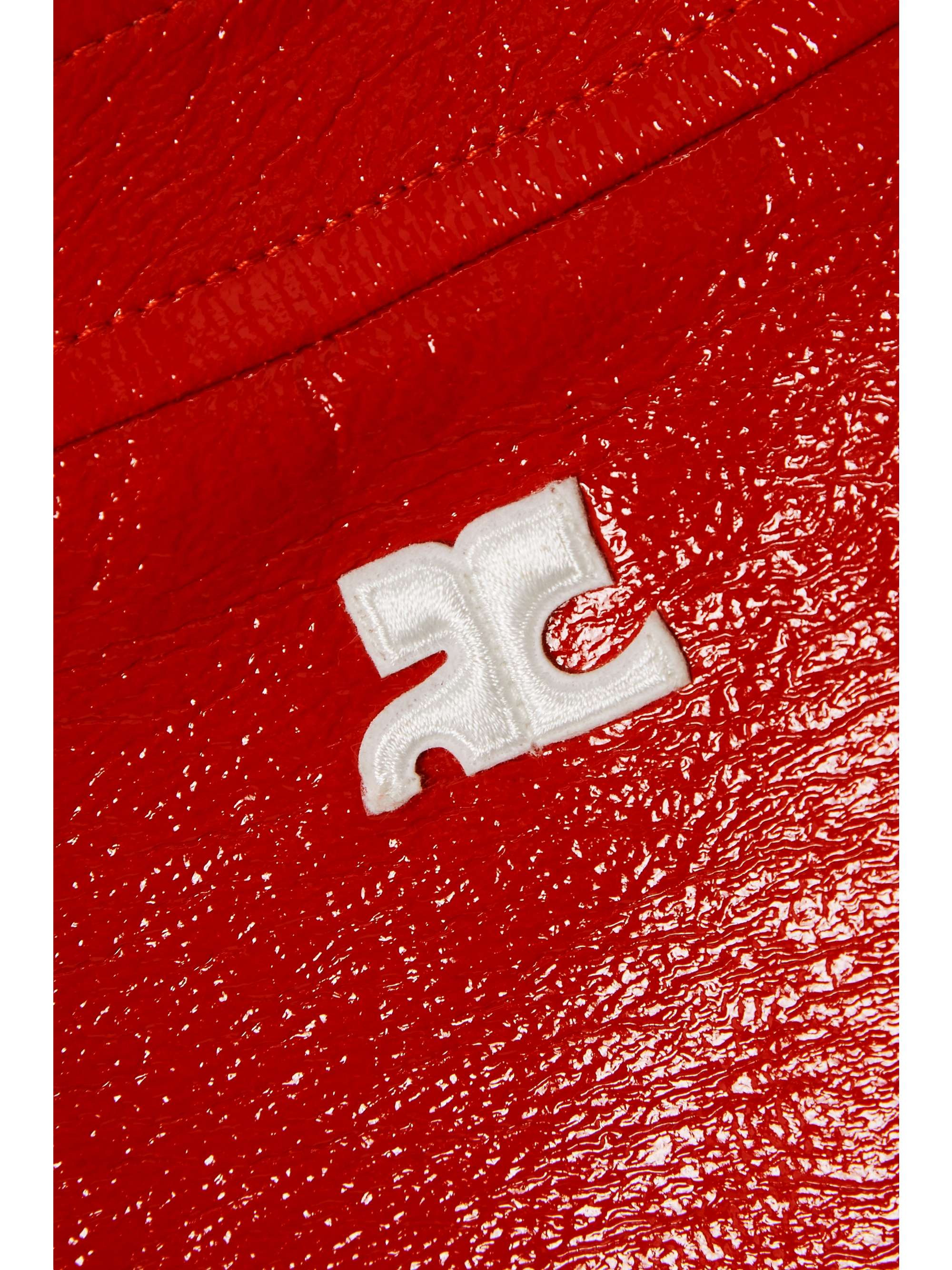 COURRÈGES Mini-jupe en vinyle de coton mélangé à appliqué