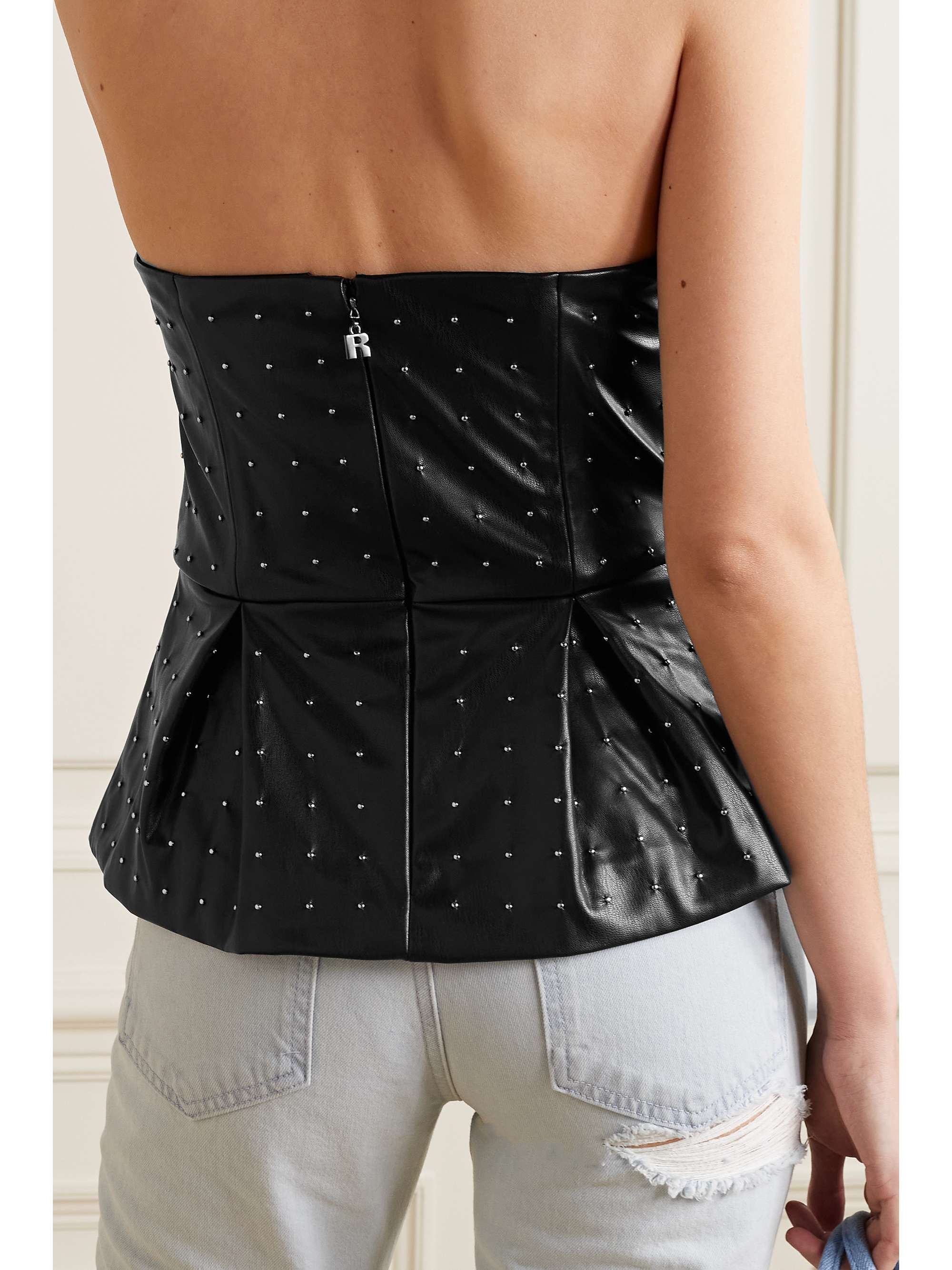 ROTATE BIRGER CHRISTENSEN Haut bustier à basque en cuir synthétique recyclé à clous