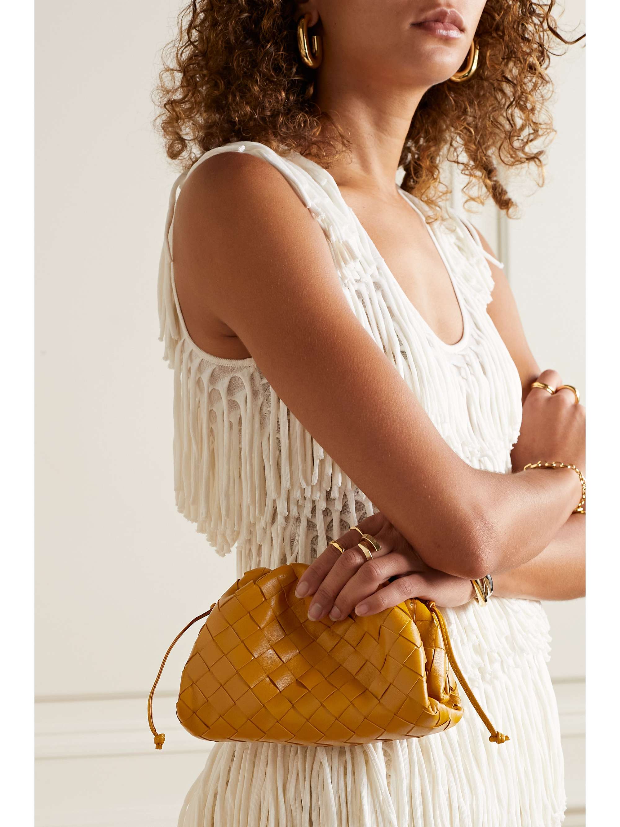 BOTTEGA The Pouch mini intrecciato leather clutch NETAPORTER