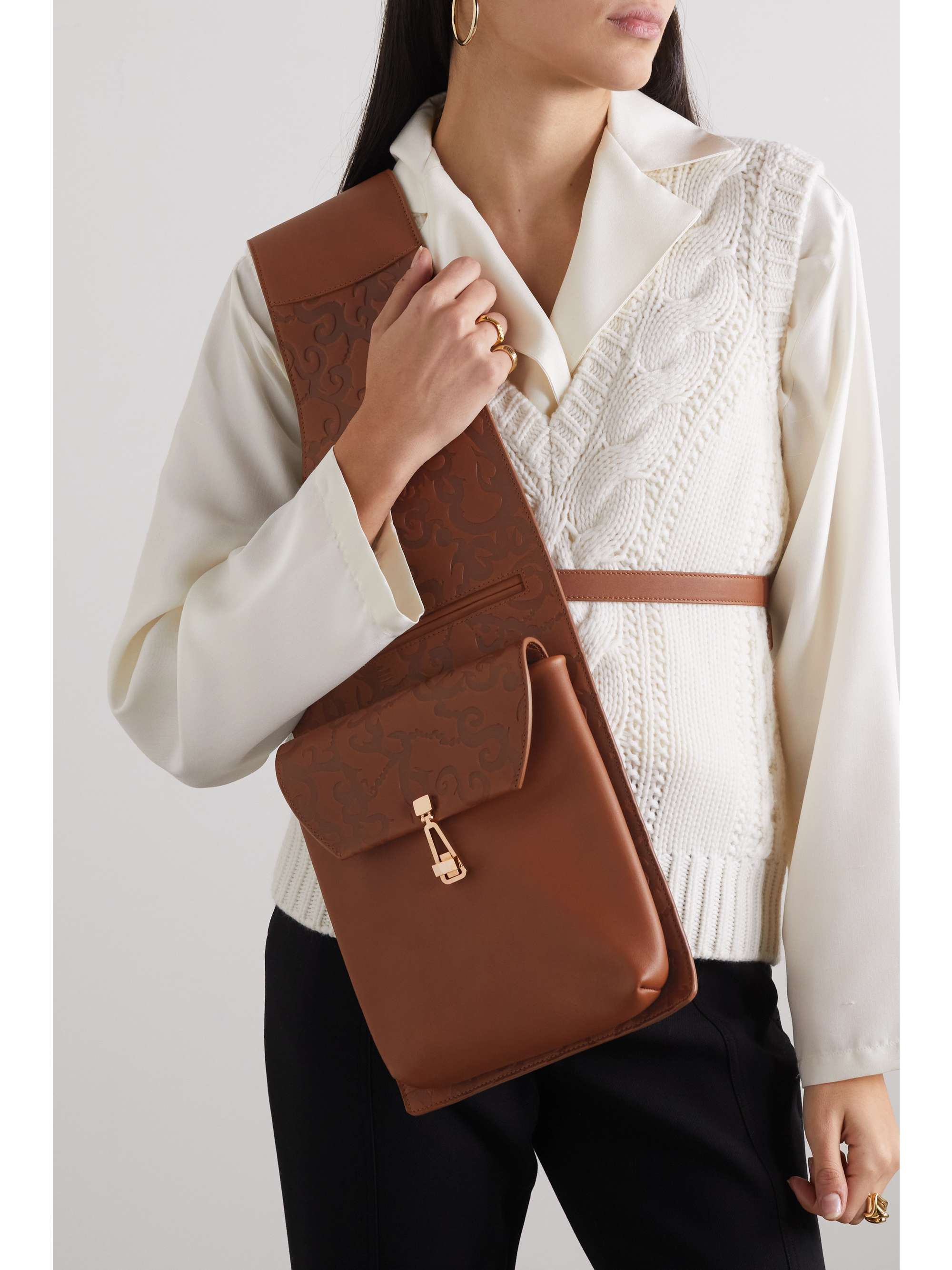 Saddle embossed leather shoulder bag