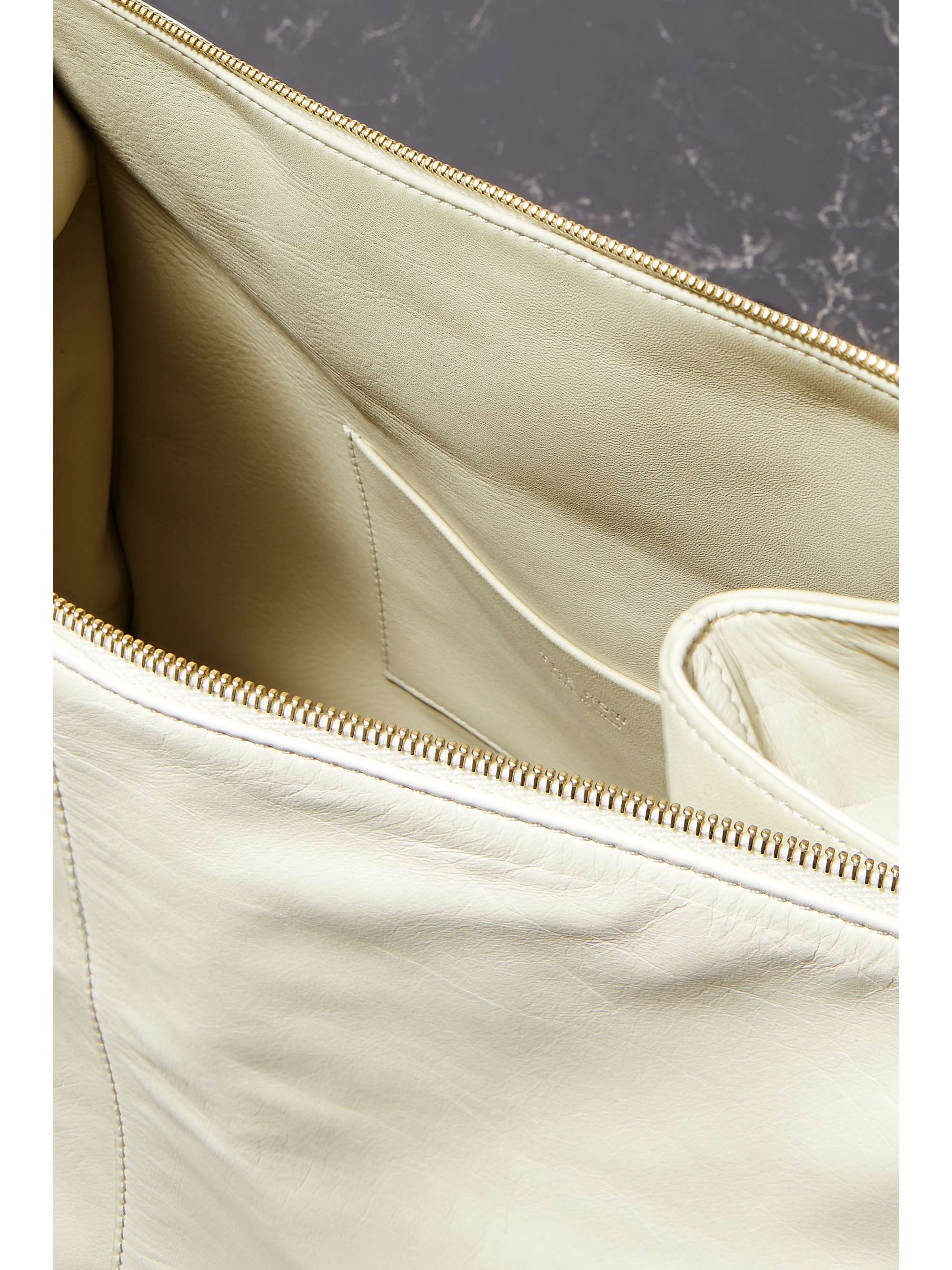 THE ROW Aspen leather clutch NETAPORTER AE