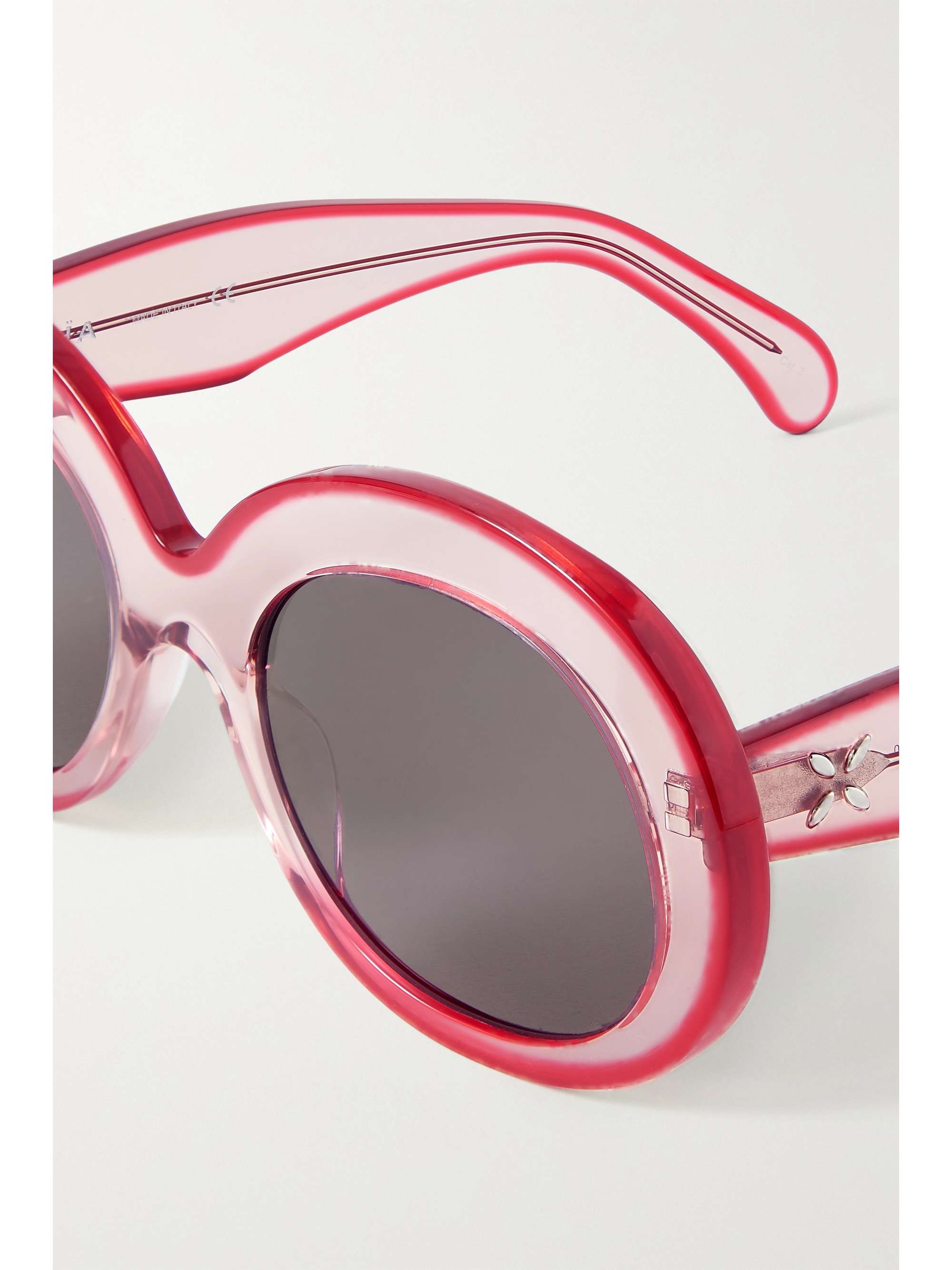 ALAÏA Zweifarbige Sonnenbrille mit rundem Rahmen aus Azetat