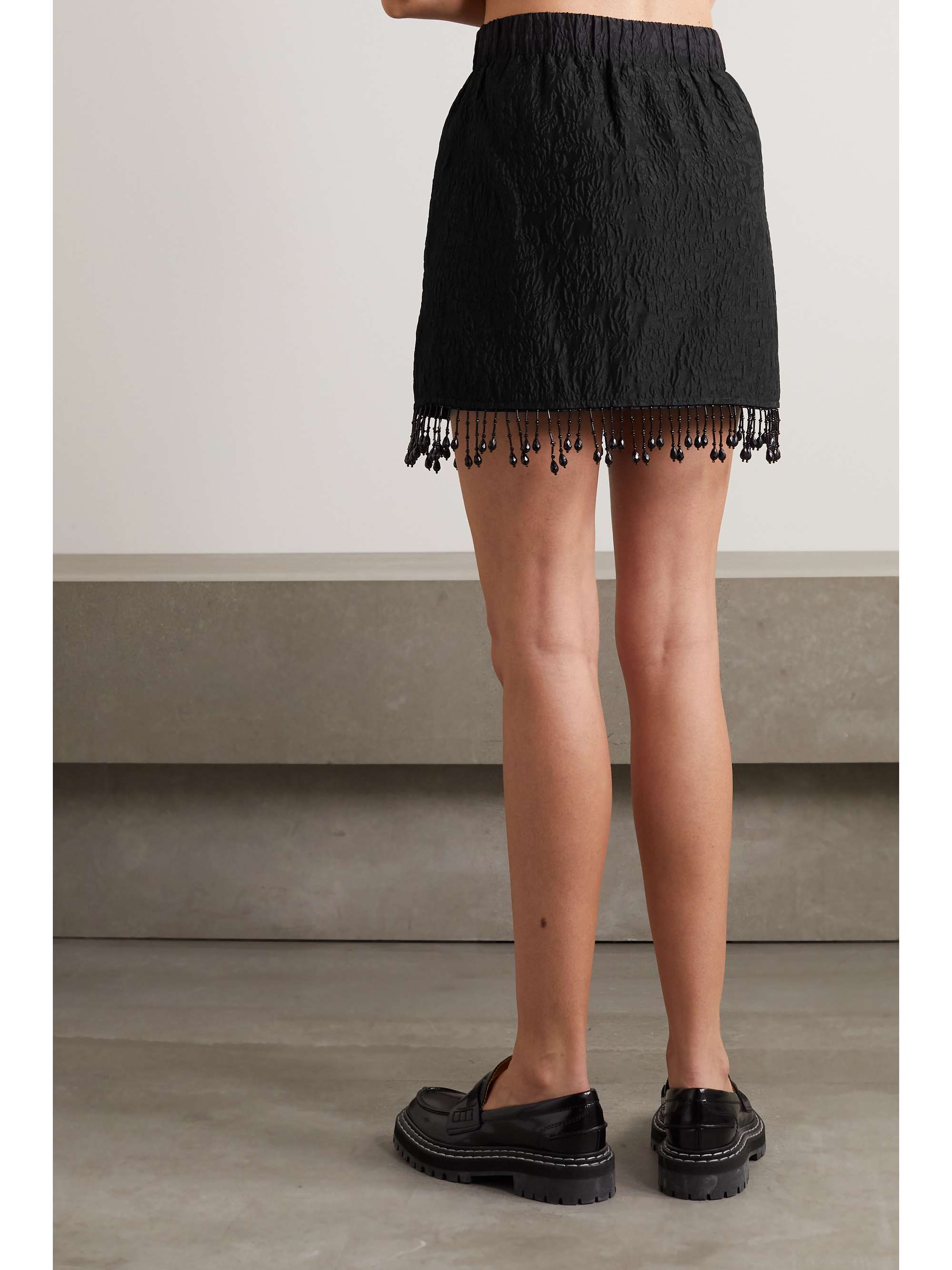 GANNI + NET SUSTAIN bead-embellished fringed recycled-cloqué mini skirt