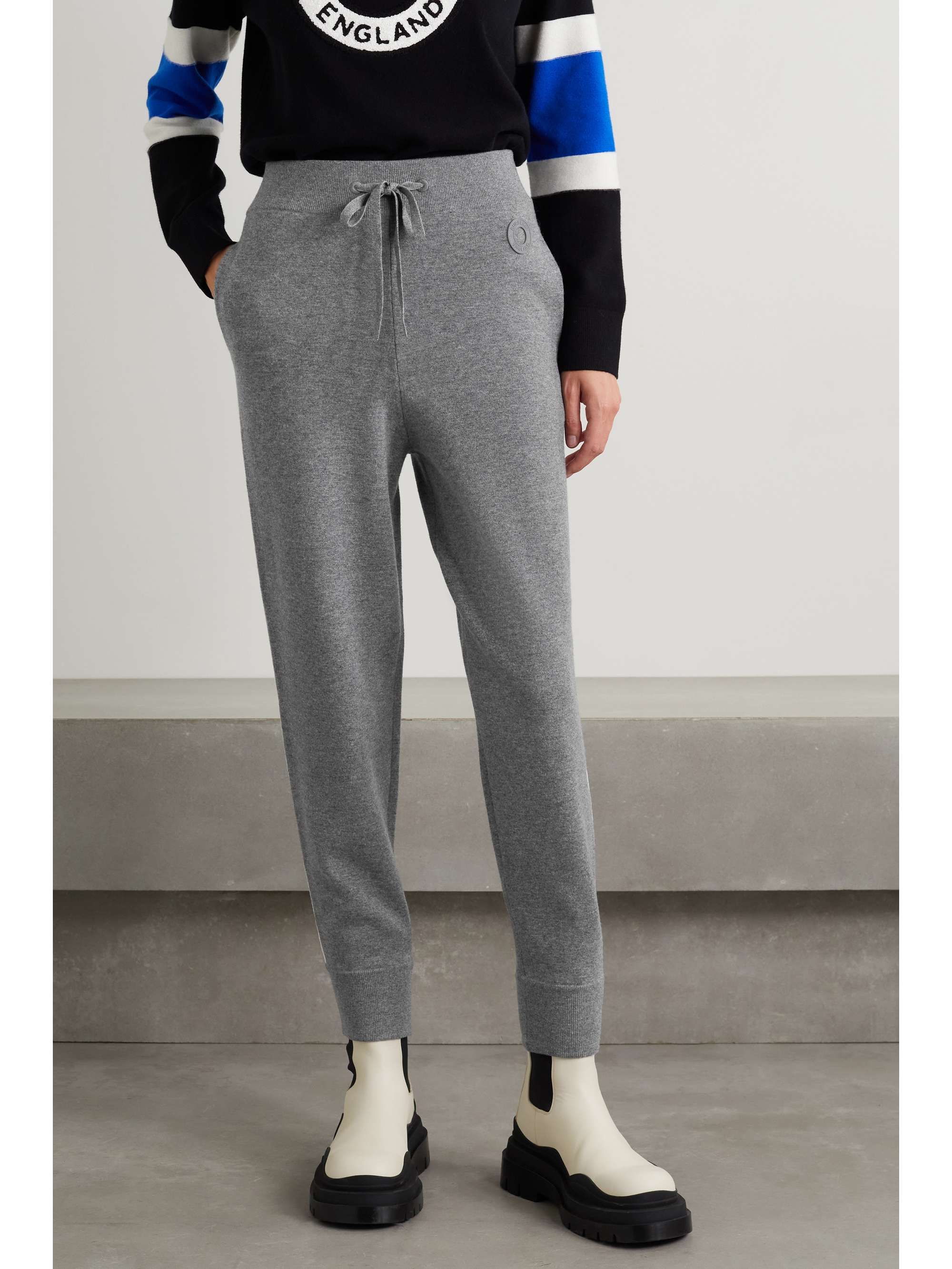 BURBERRY Appliquéd paneled knitted tapered track pants