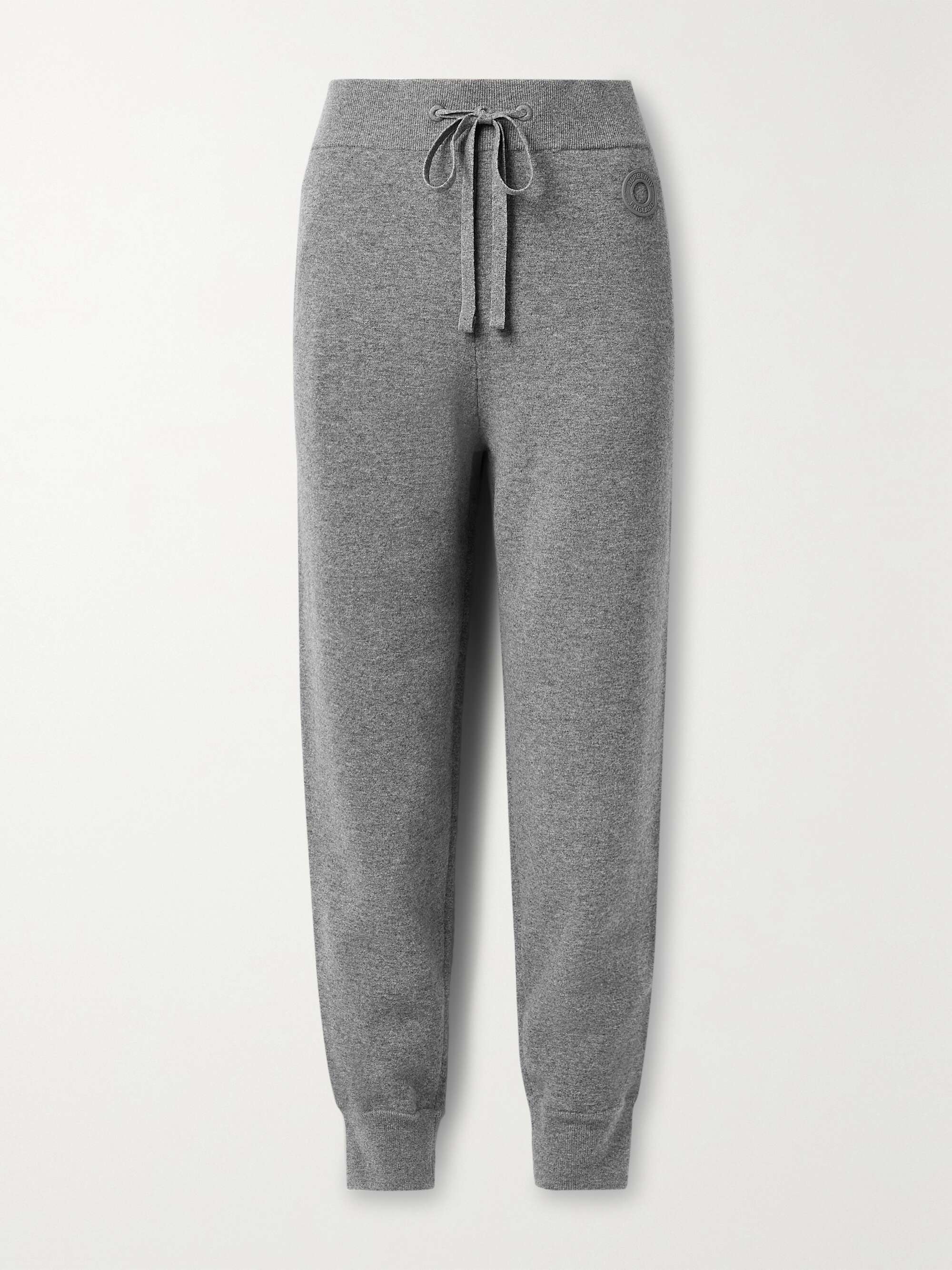 BURBERRY Appliquéd paneled knitted tapered track pants | NET-A-PORTER