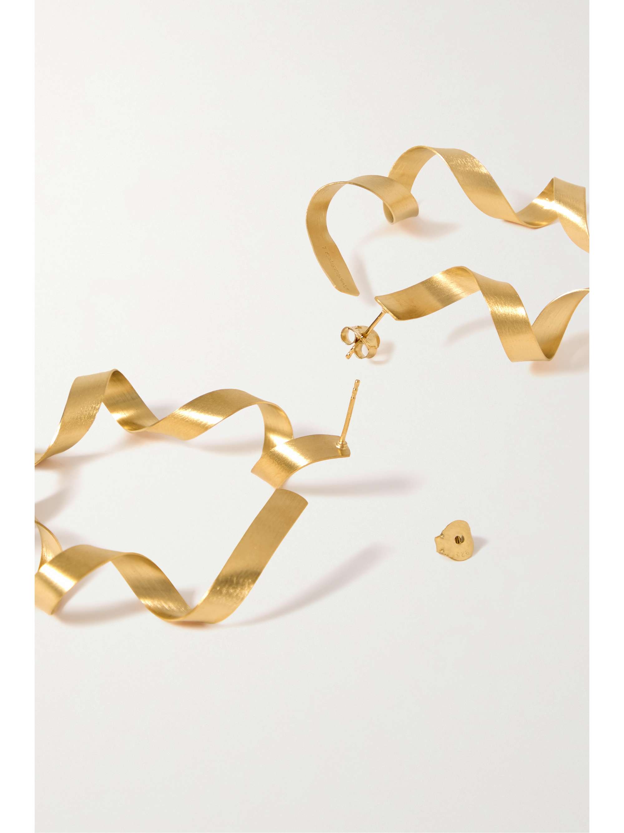 COMPLETEDWORKS This is What Happens When the Paper Shredder Malfunctions Gold-plated hoop earrings
