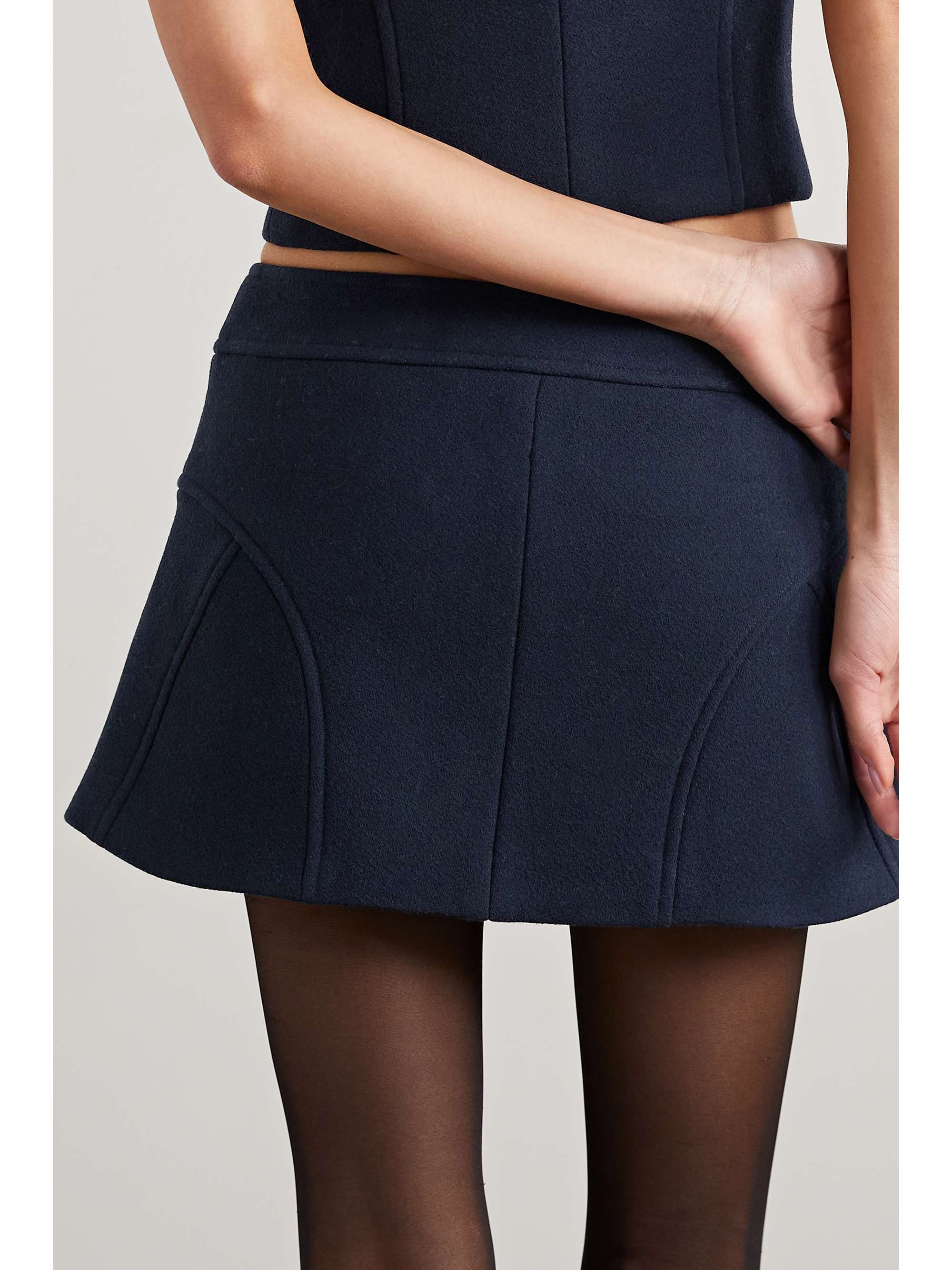 KHAITE Keene wool-crepe mini skirt