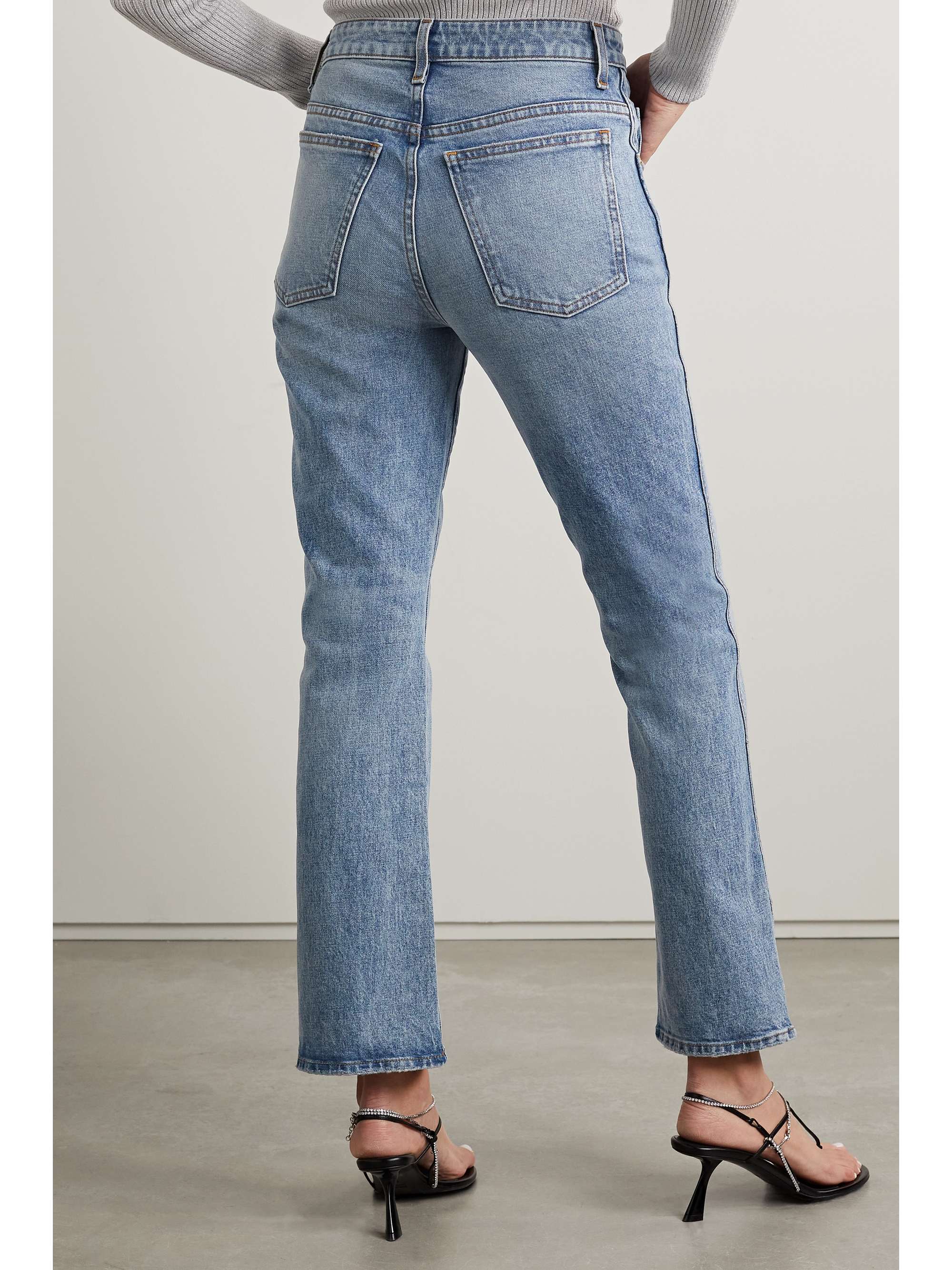 KHAITE Vivian verkürzte, hoch sitzende Bootcut-Jeans