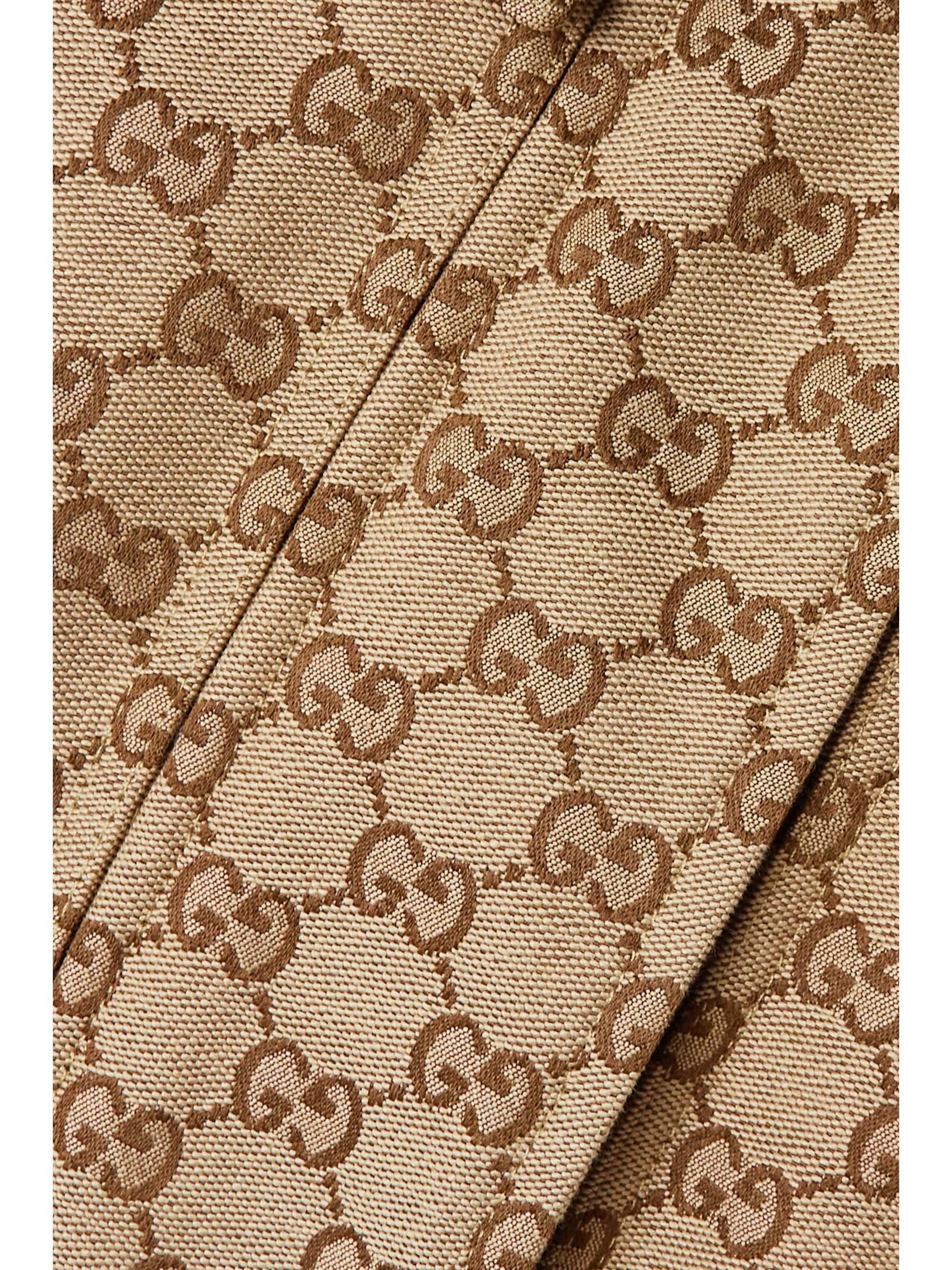GUCCI Wattierte Daunenjacke aus Jacquard aus einer Baumwollmischung mit Kapuze