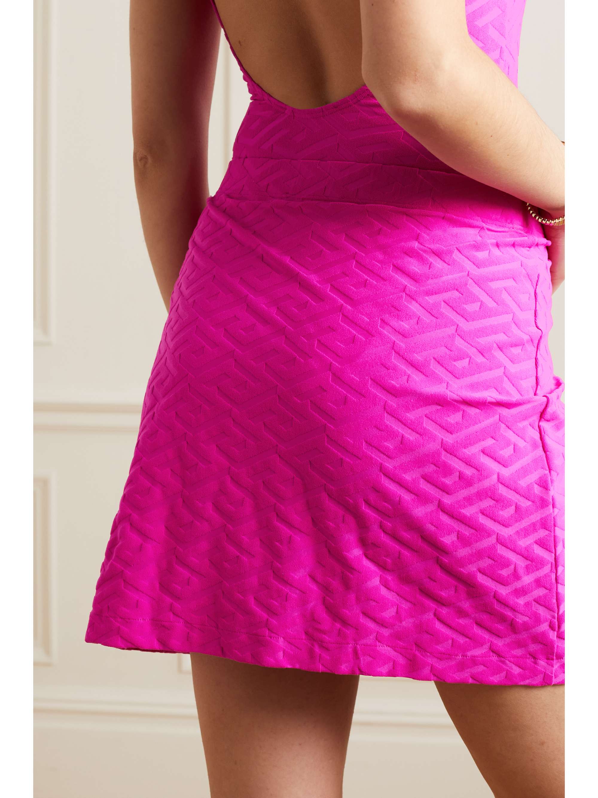 VERSACE La Greca embossed stretch-terry mini skirt