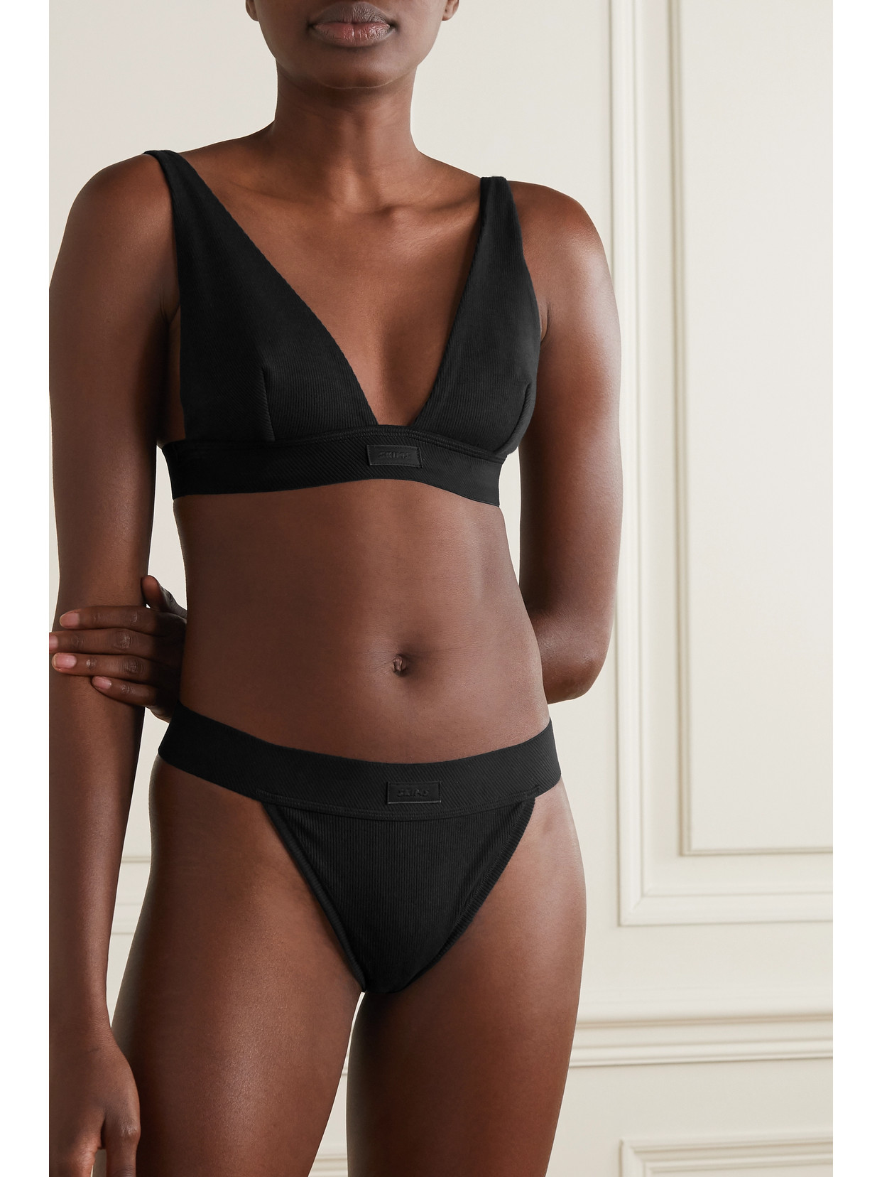 Skims Plunge Ribbed Cotton-blend Jersey Bralette In Black
