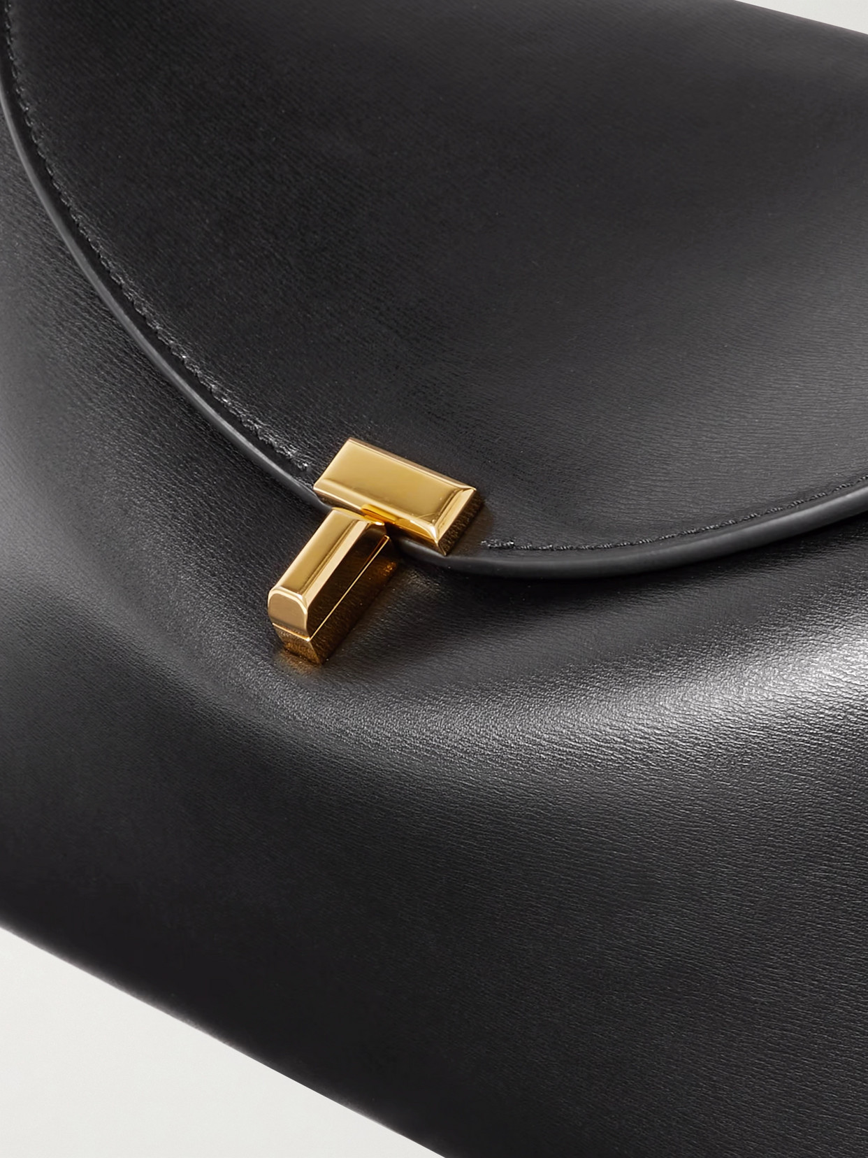 Totême Structured Black Leather Shoulder Bag With Flap Closure