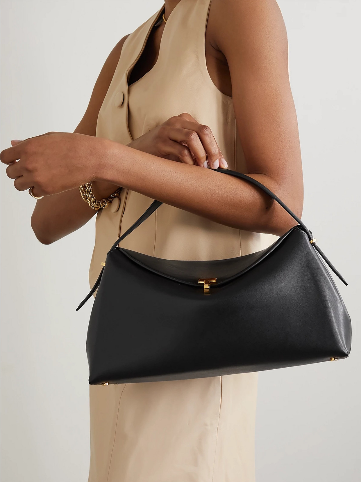 Totême Structured Black Leather Shoulder Bag With Flap Closure