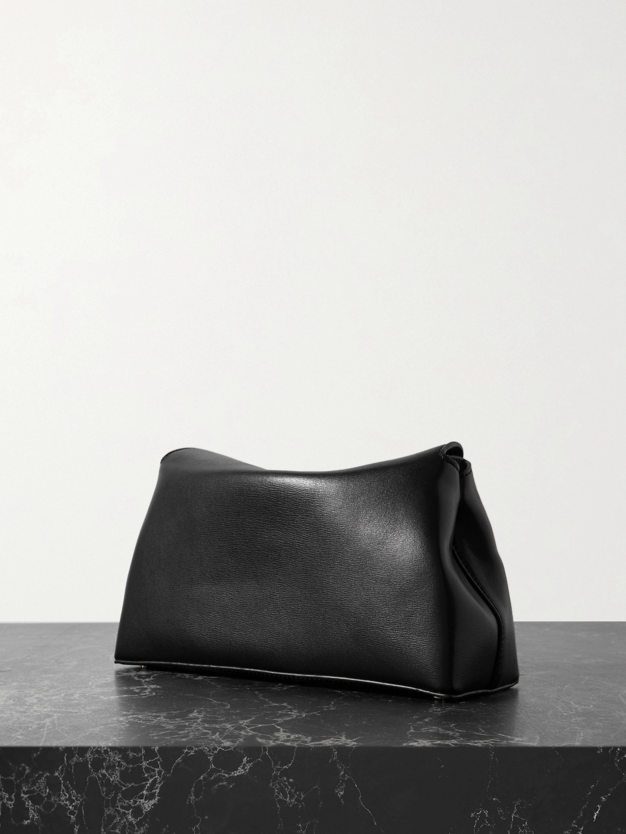 Shop Totême T-lock Leather Clutch In Black