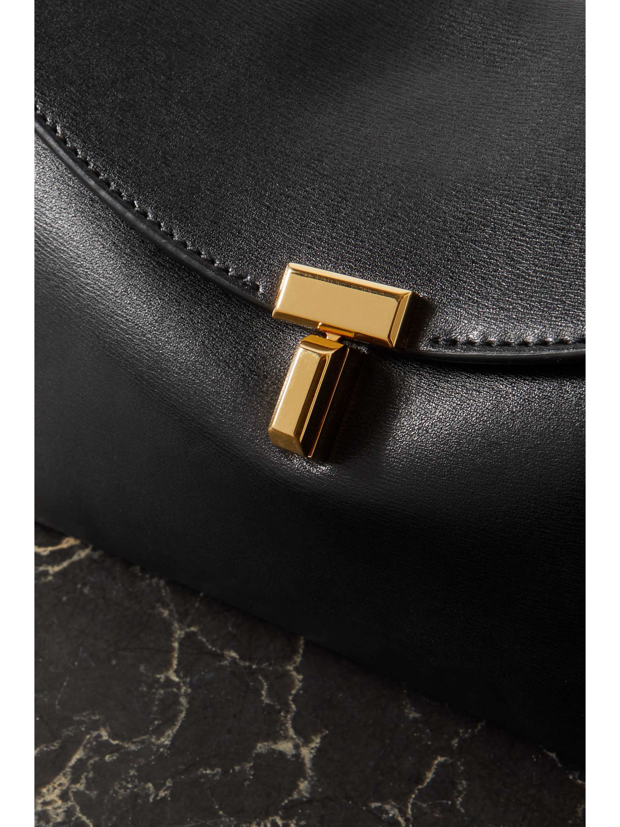 TOTEME T-Lock textured-leather clutch