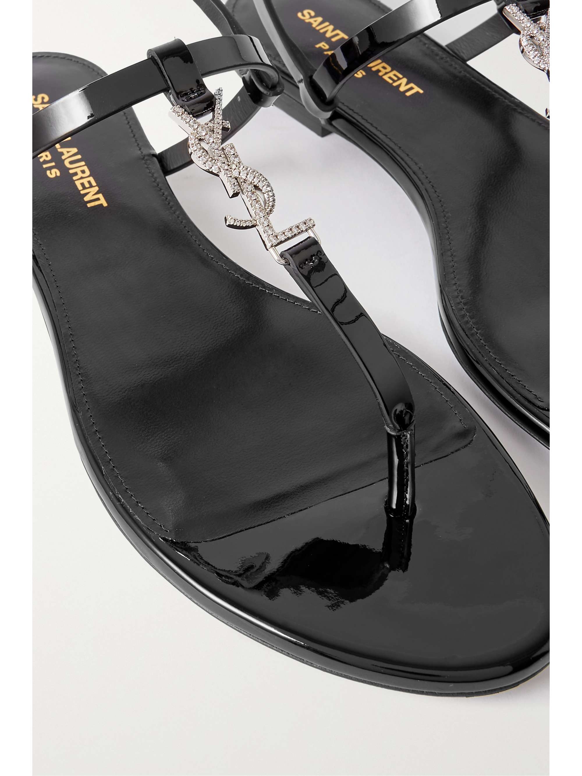 Black Cassandra logo-embellished patent-leather slingback sandals | SAINT LAURENT | NET-A-PORTER