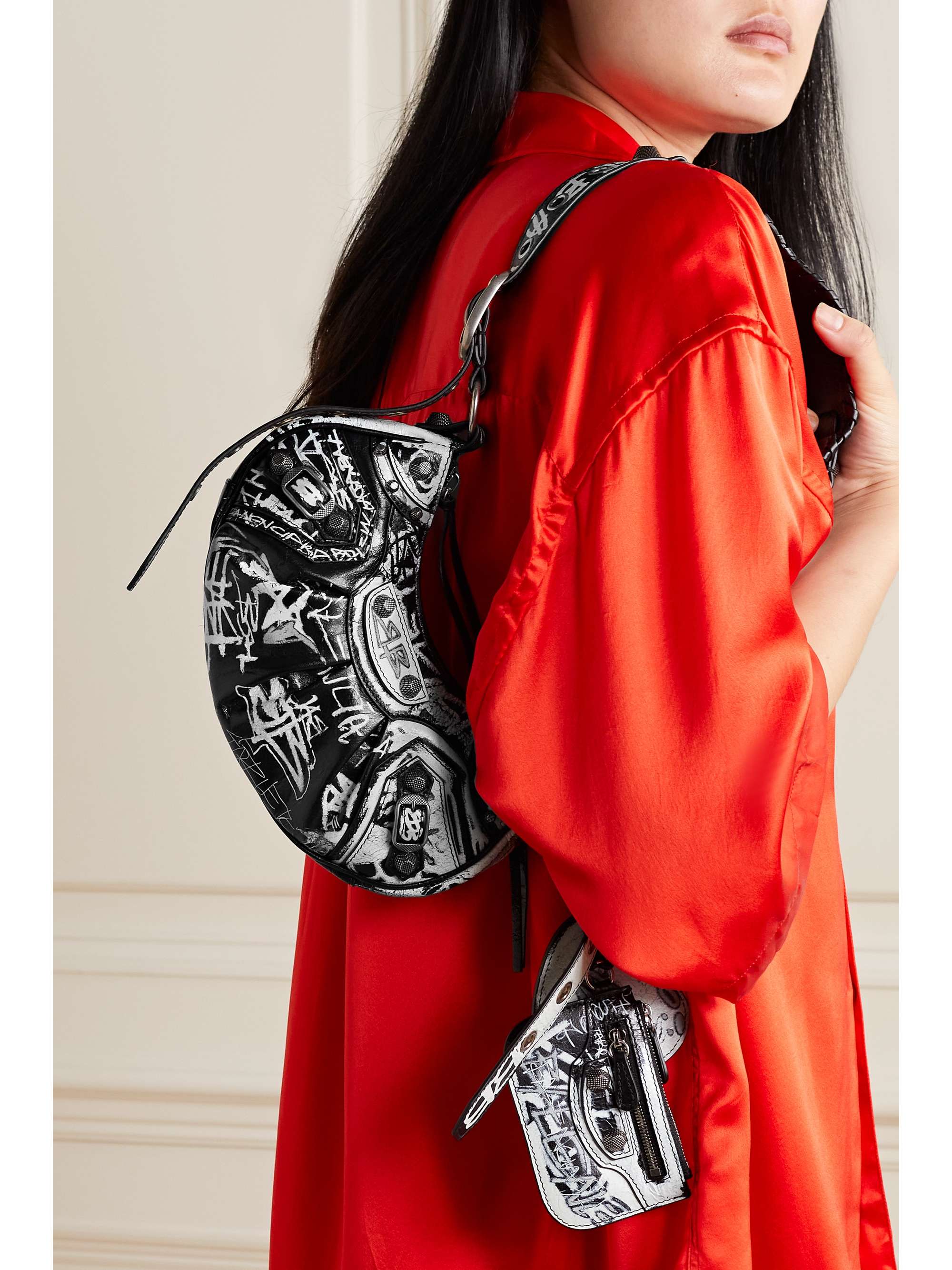 BALENCIAGA Le Cagole XS studded printed leather shoulder bag | NET  