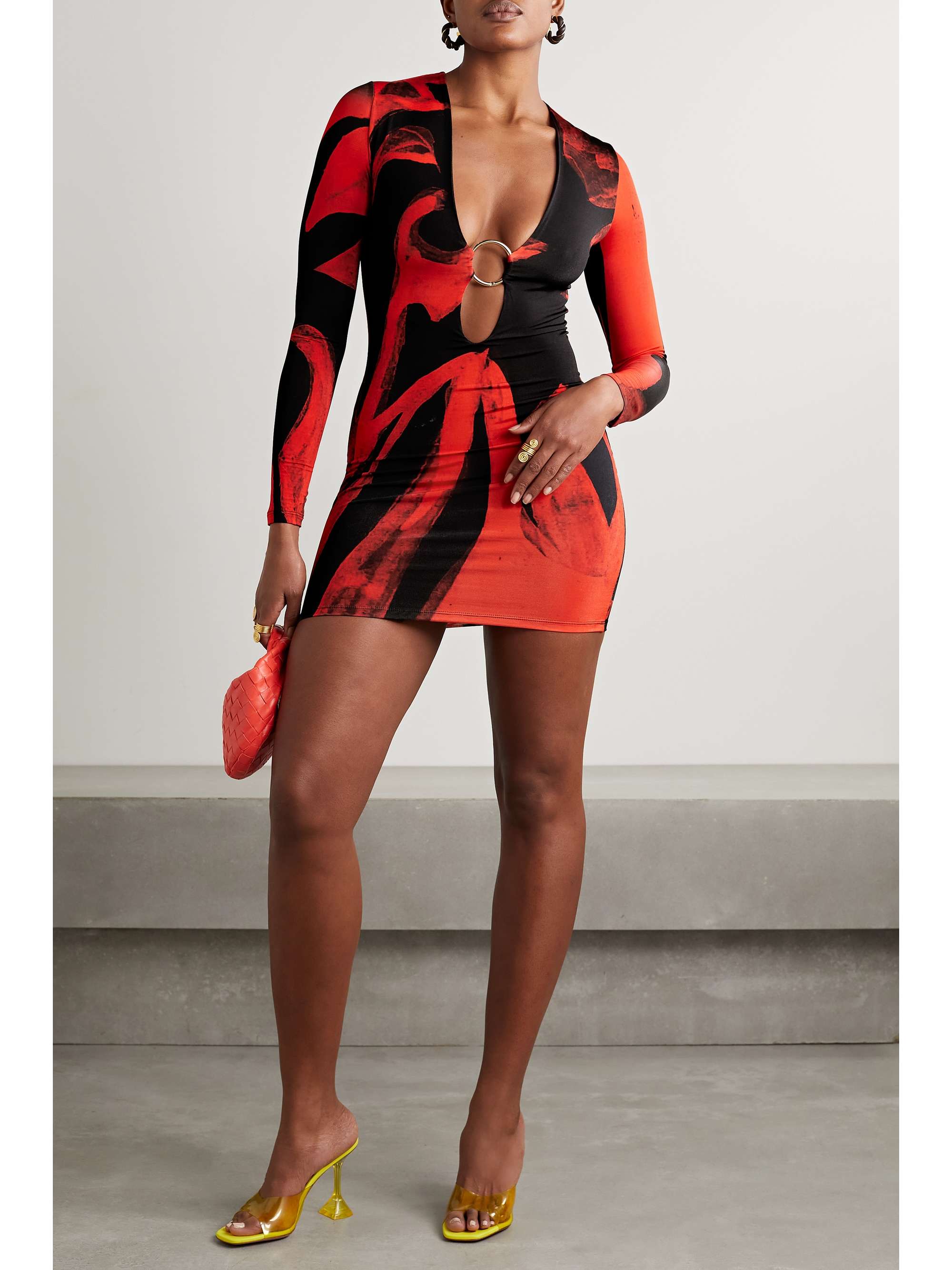 Louisa Ballou specializes in mood-boosting resortwear you can wear beyond the beach - this 'Helios' dress works just as well styled with sandals for your evening plans. Cut from stretch-jersey, it's printed with the label's 'Red Queen' motif and has a plunging neckline pierced with a gold-tone ring.