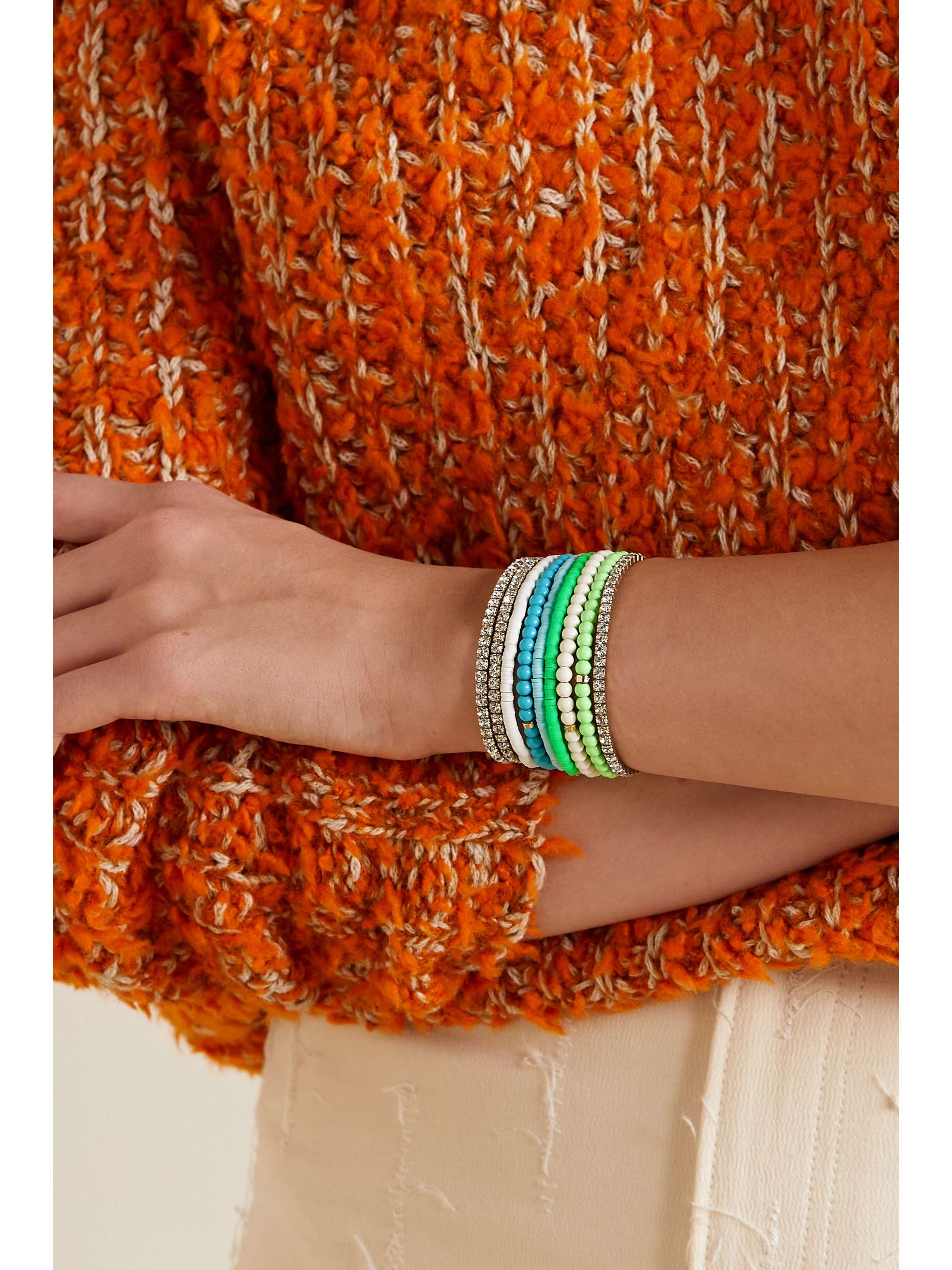 ROXANNE ASSOULIN Set of nine beaded, gold-tone and crystal bracelets