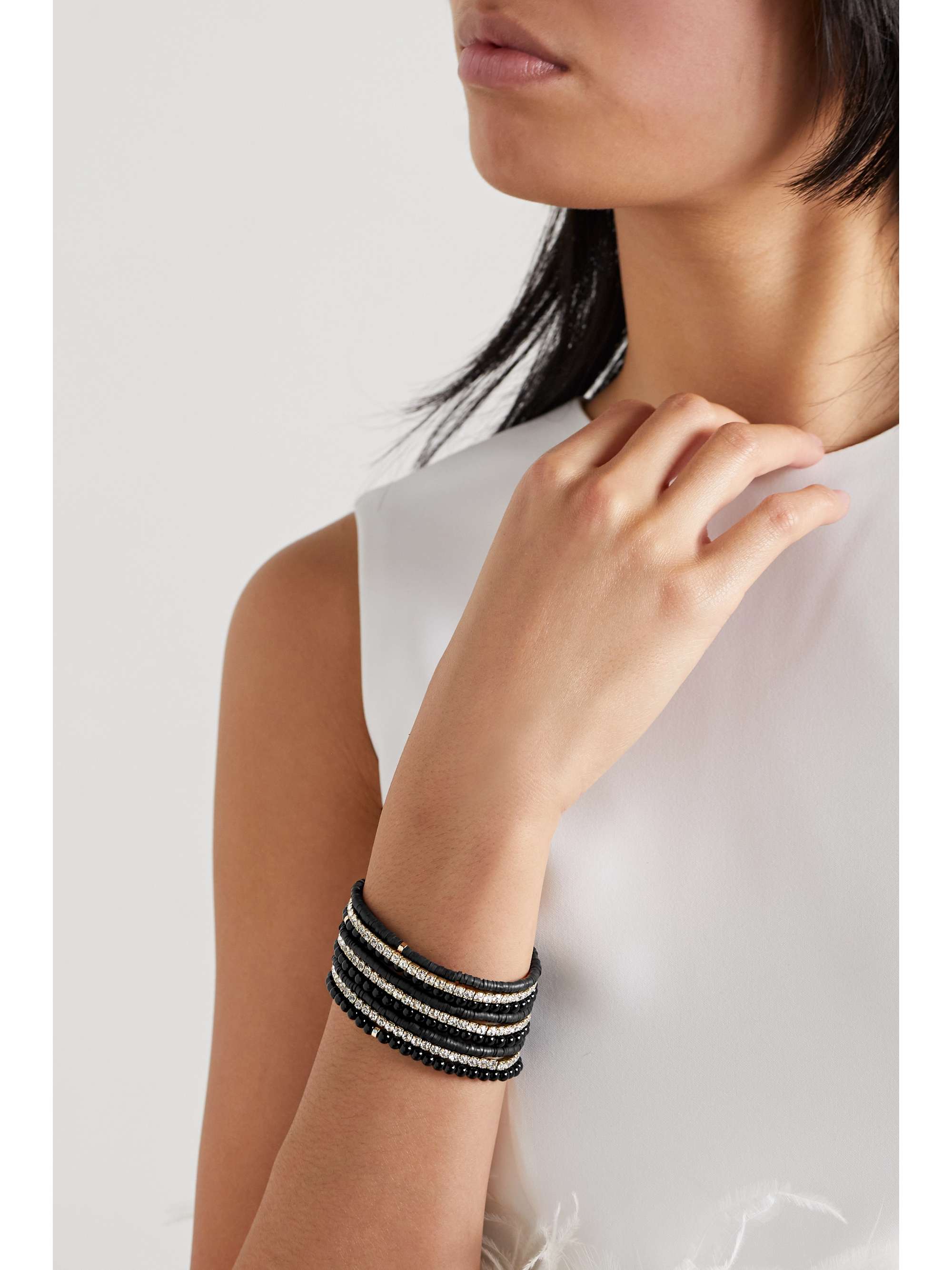 ROXANNE ASSOULIN Set of nine beaded, gold-tone and crystal bracelets