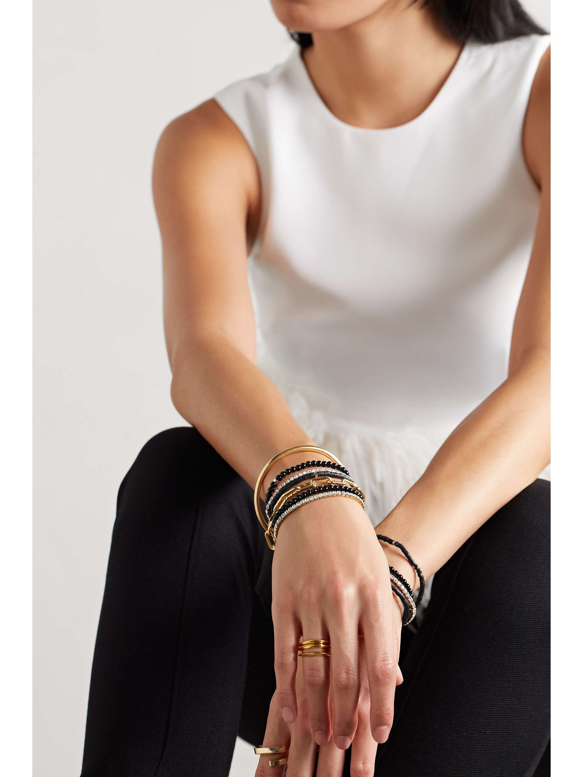 ROXANNE ASSOULIN Set of nine beaded, gold-tone and crystal bracelets