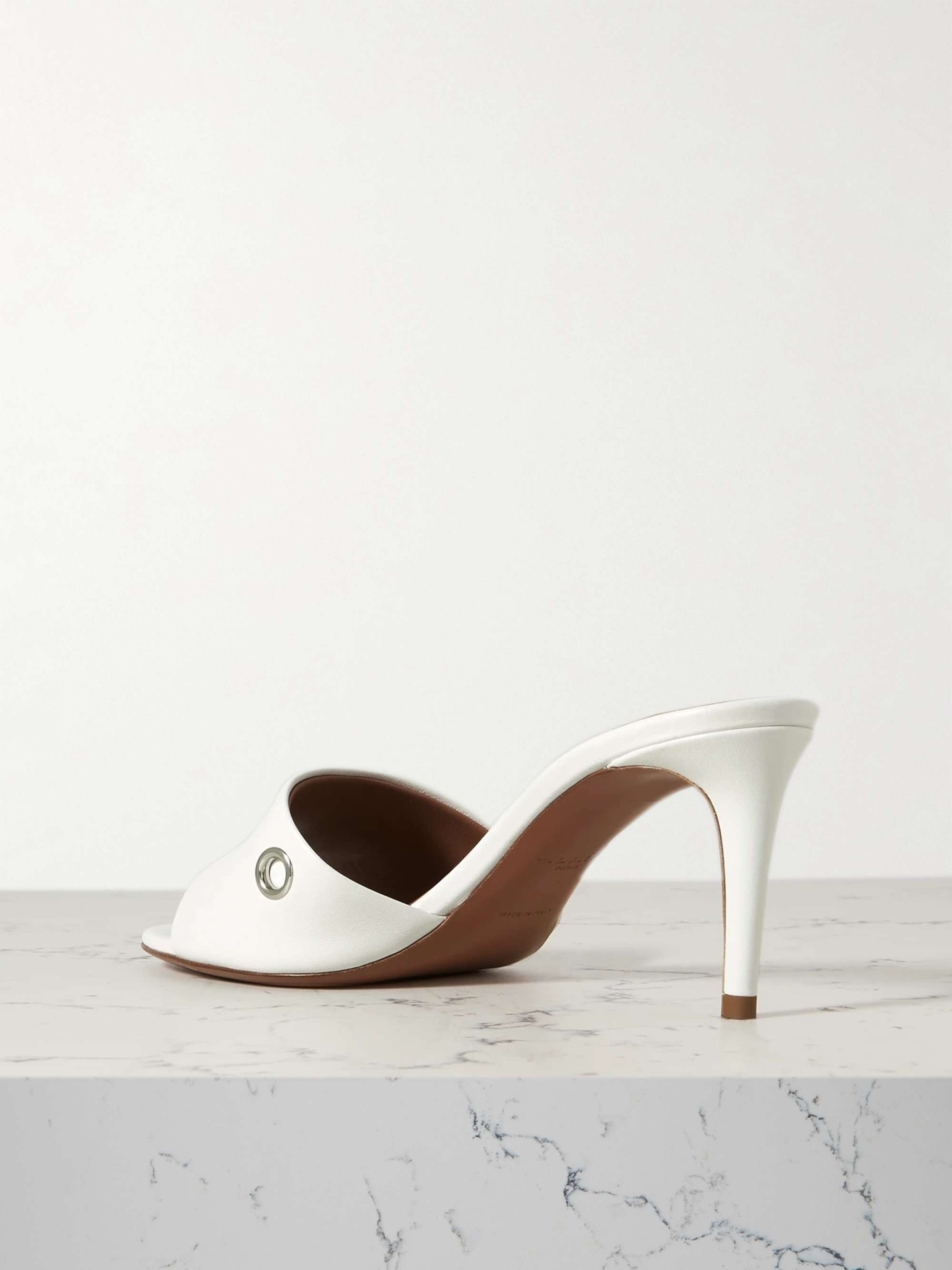 ALAÏA 75 embellished leather mules