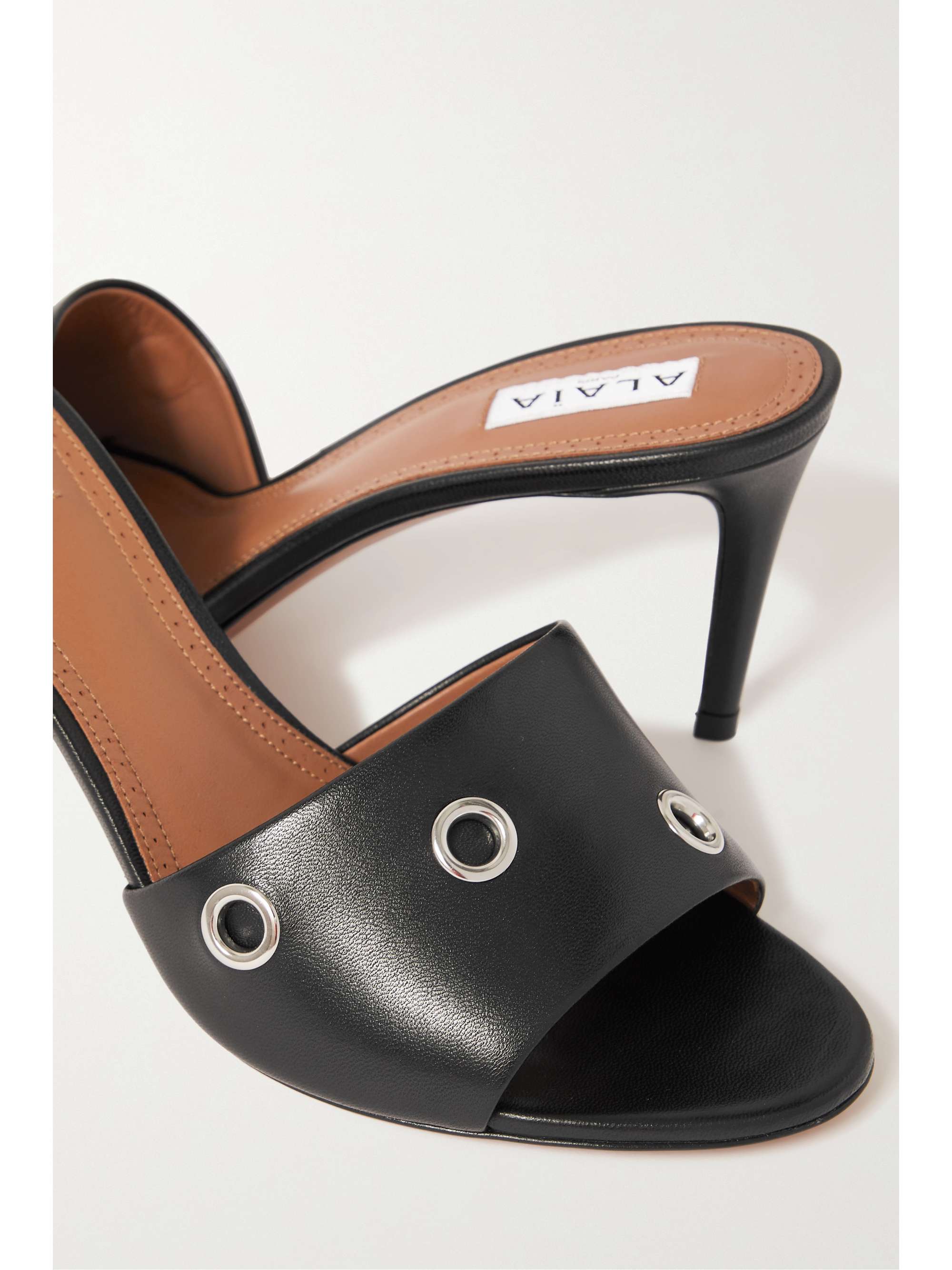 ALAÏA 75 embellished leather mules