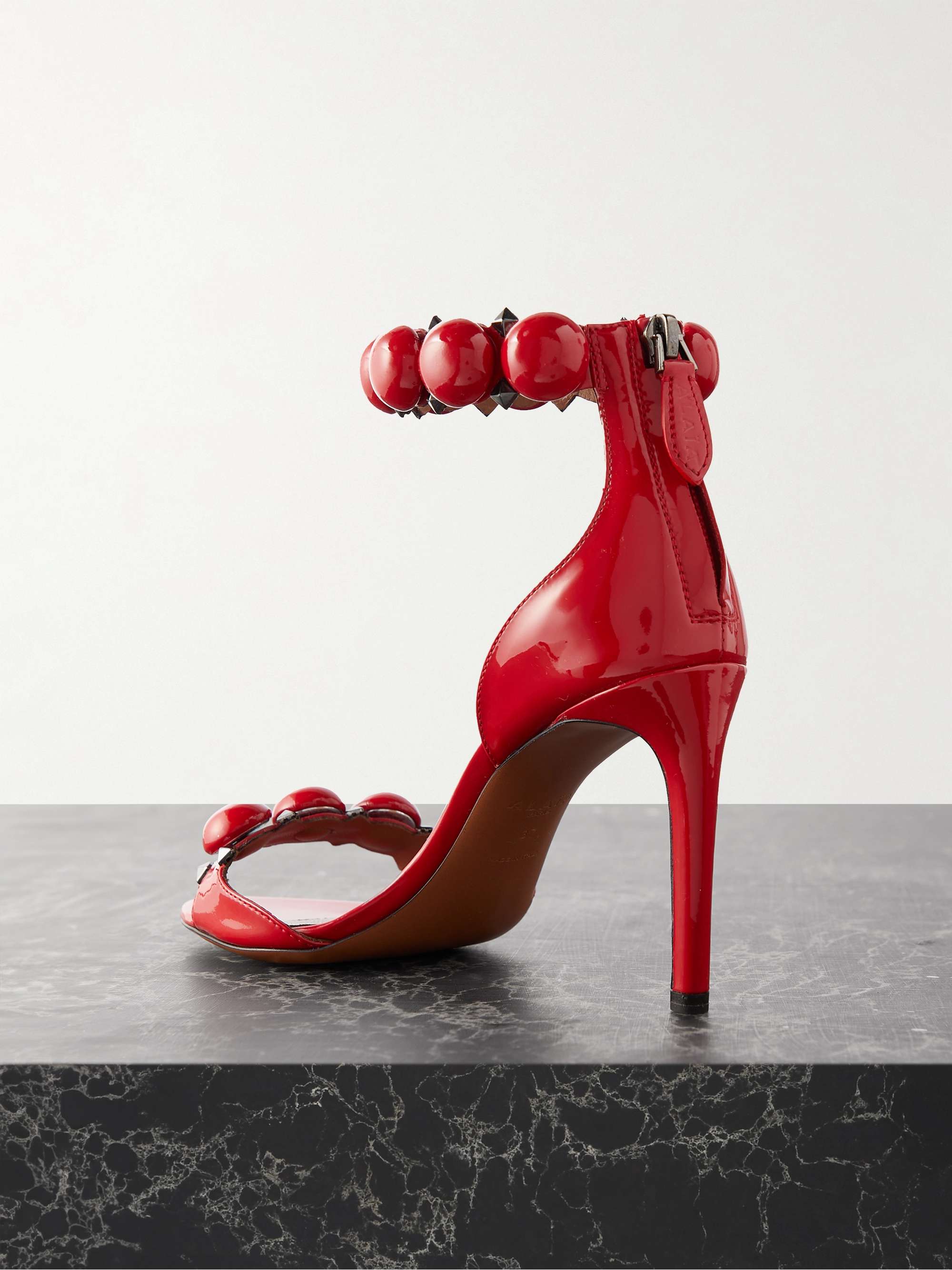 ALAÏA La Bombe 90 studded patent-leather sandals