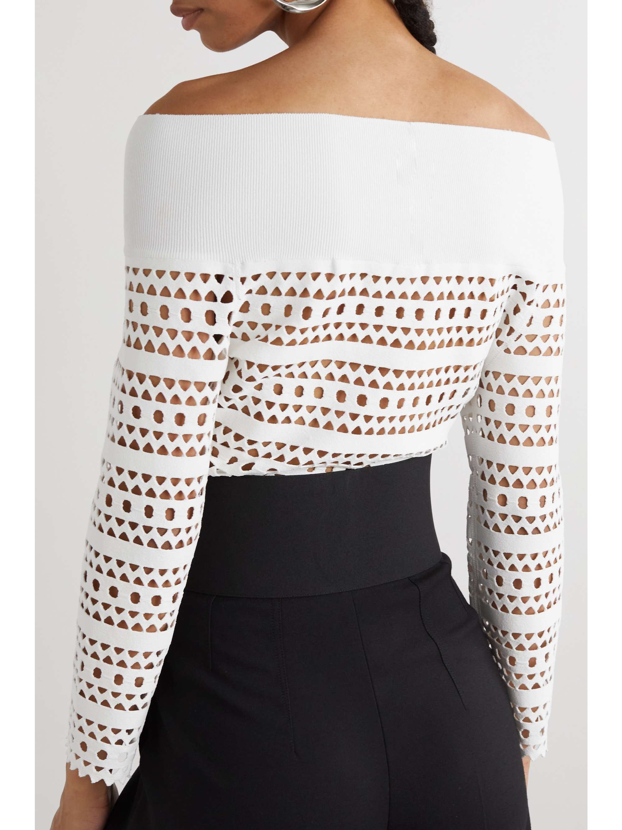 ALAÏA Off-the-shoulder laser-cut jersey top