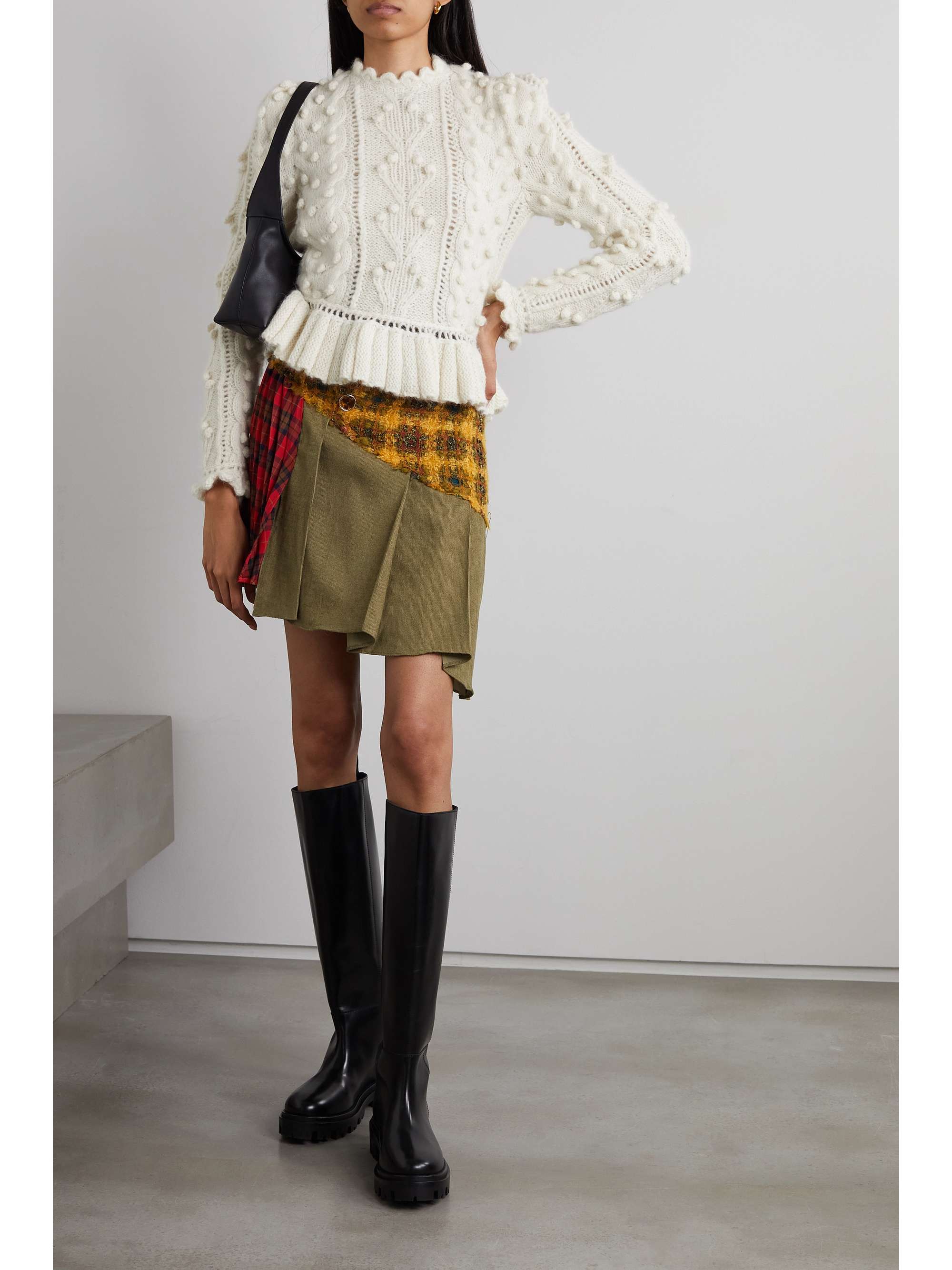 DÔEN Clove pointelle-knit alpaca-blend peplum sweater