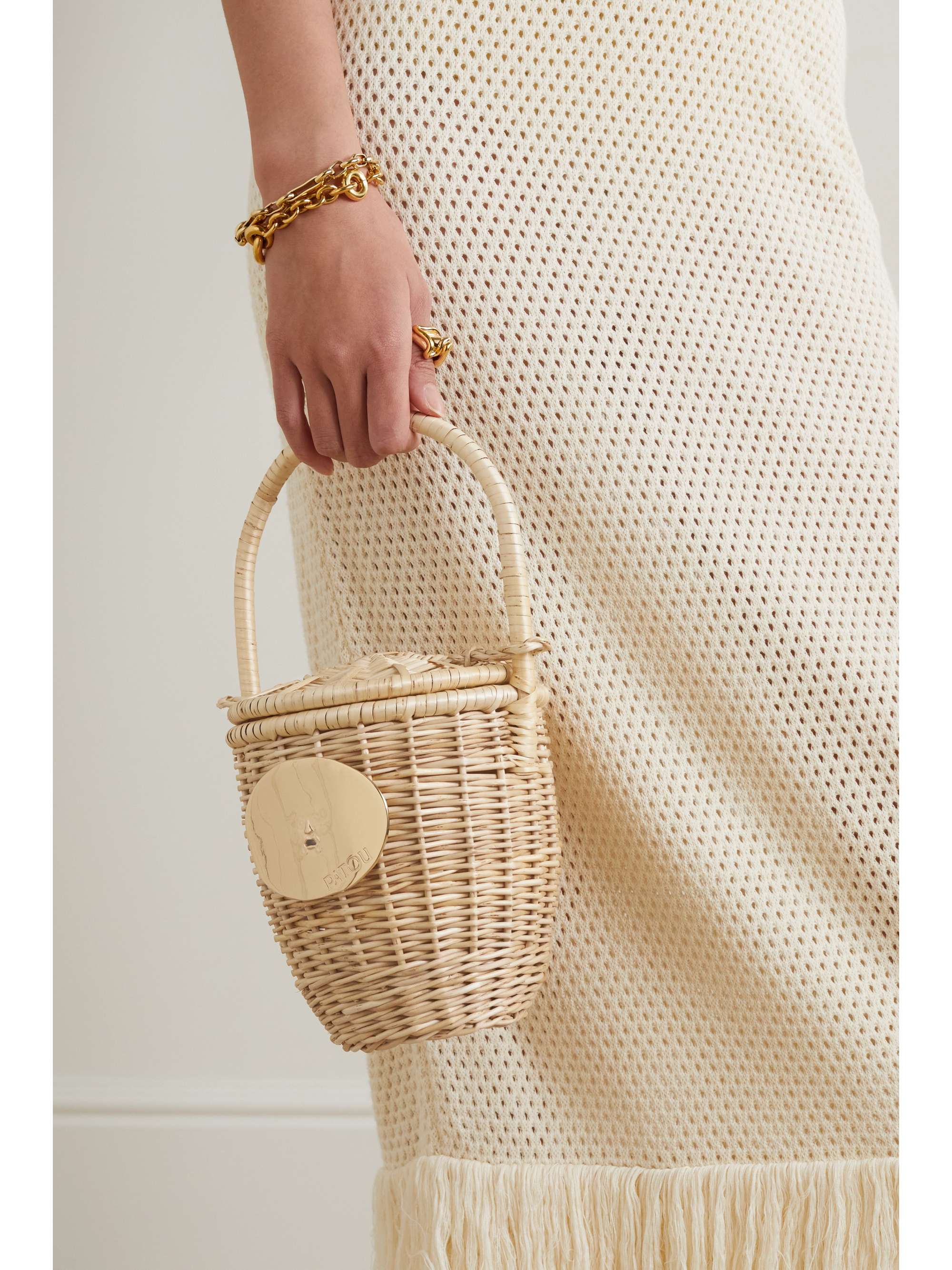 PATOU Embellished wicker bucket bag NETAPORTER