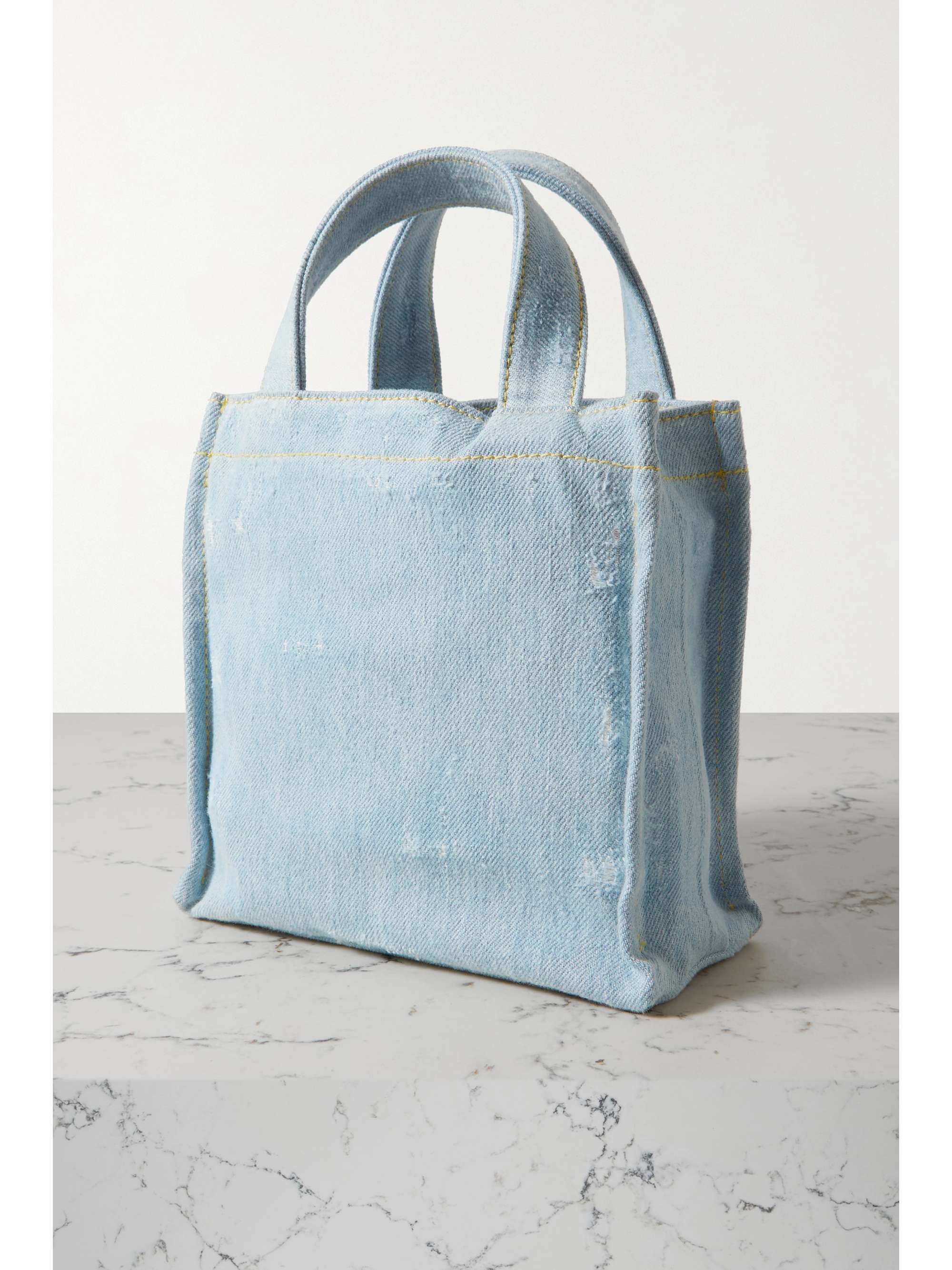 ACNE STUDIOS Mini embossed distressed denim tote NETAPORTER