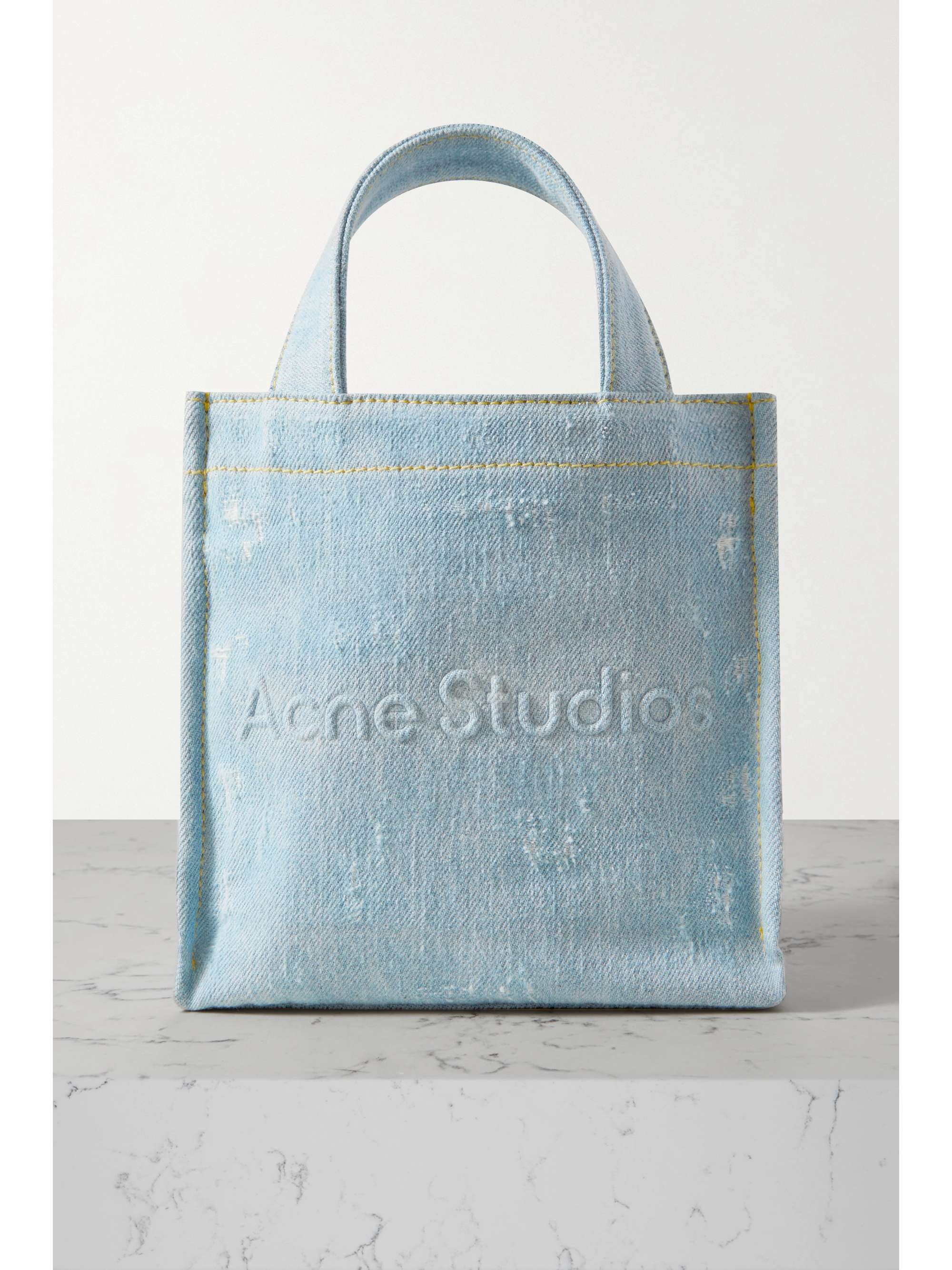 ACNE STUDIOS Mini embossed distressed denim tote NETAPORTER