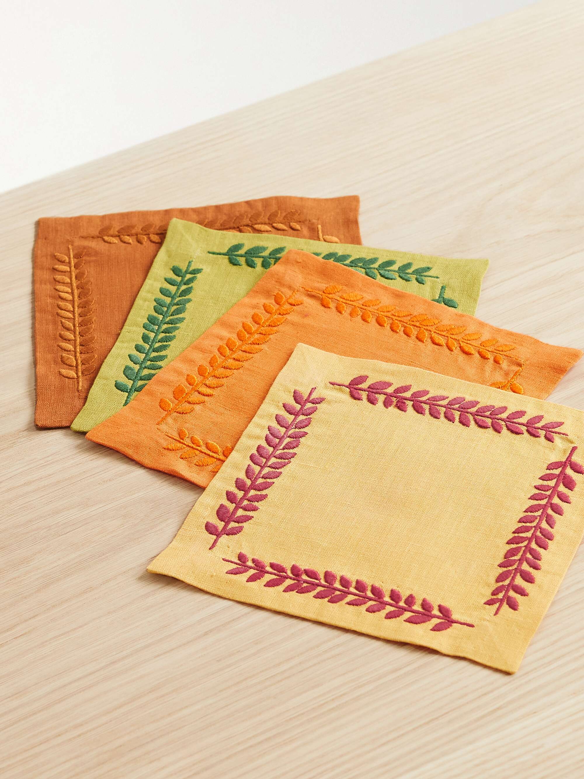 Set of four embroidered linen cocktail napkins
