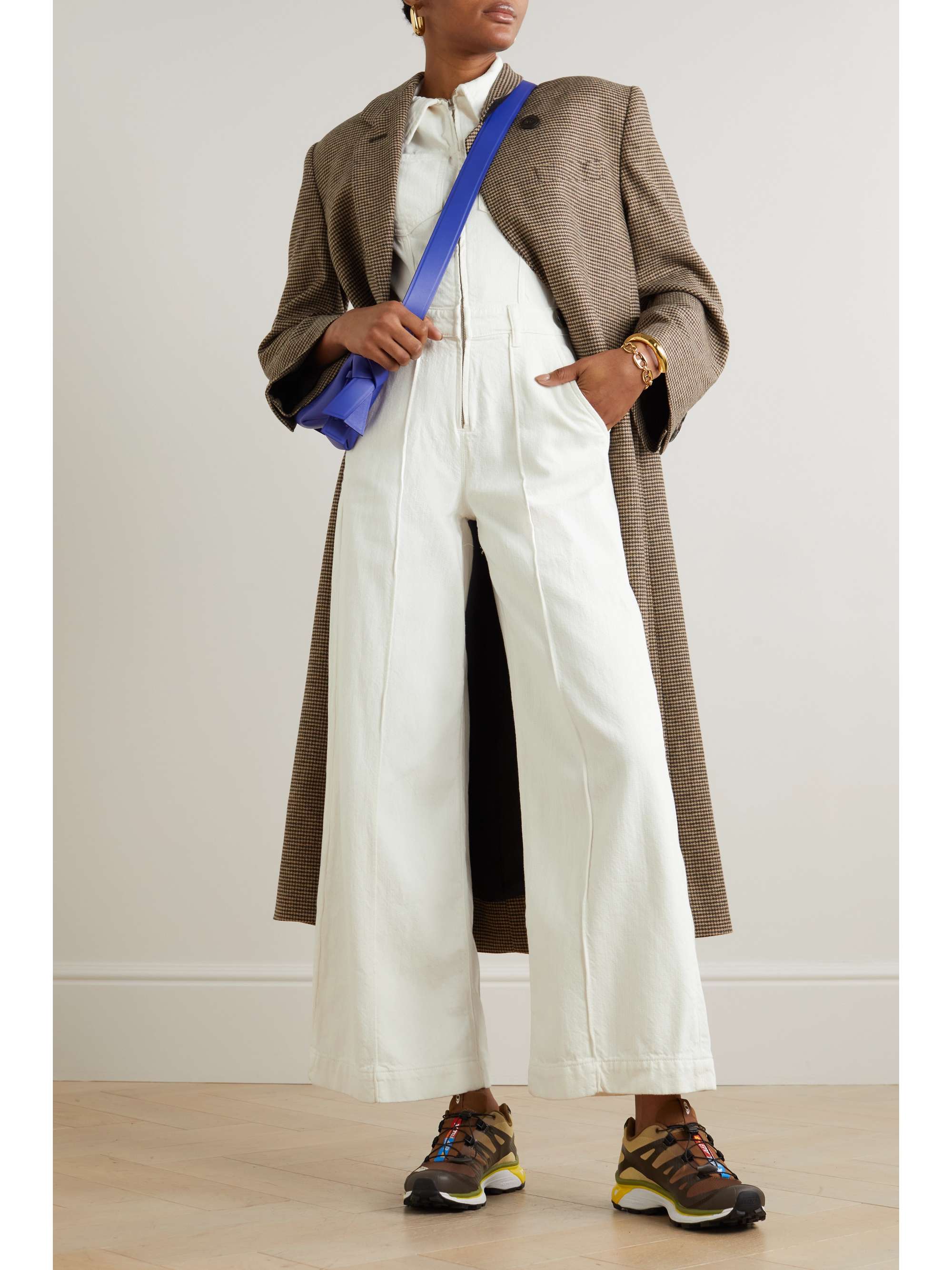 FRAME describes its jumpsuits as "the original five-minute outfit" thanks to the way you only need to pick the shoes for styling. This one is made from denim with a slightly fitted waist and wide legs. The zip can be adjusted to create a lower neckline.