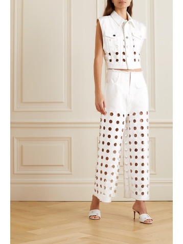 Alaïa Embroidered laser-cut frayed low-rise jeans