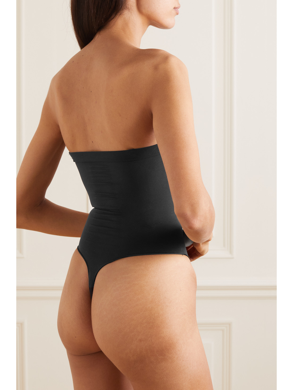 Shop Skims Seamless Sculpt Strapless Thong Bodysuit In Black