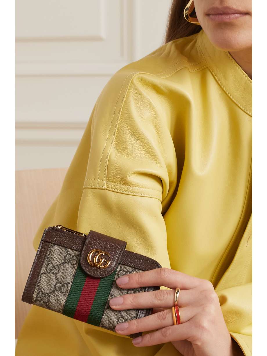 Gucci Vs Louis Vuitton A Battle Of Luxury Titans