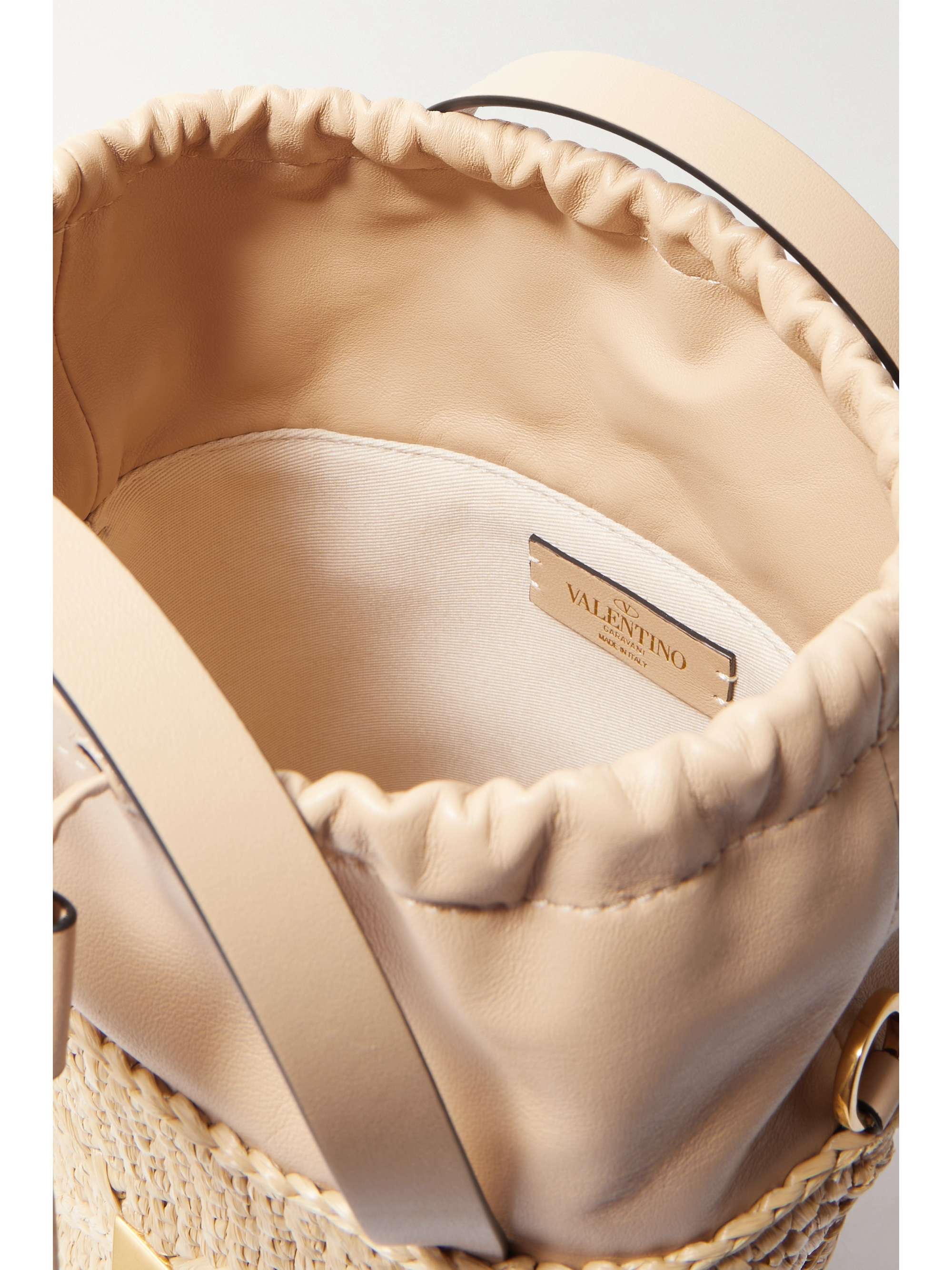 VALENTINO GARAVANI Valentino Garavani Roman Stud raffia and leather bucket bag