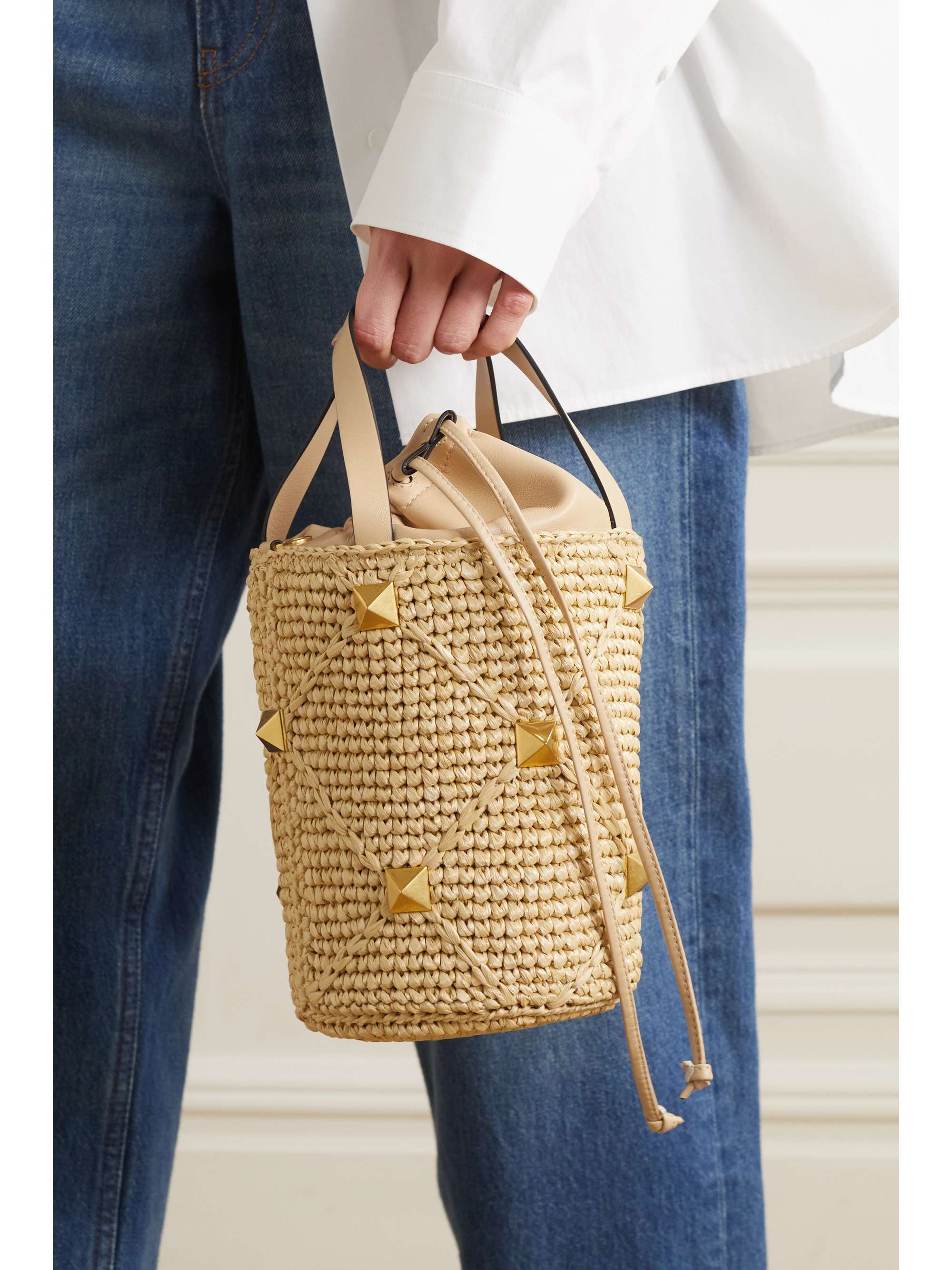 VALENTINO GARAVANI Valentino Garavani Roman Stud raffia and leather bucket bag