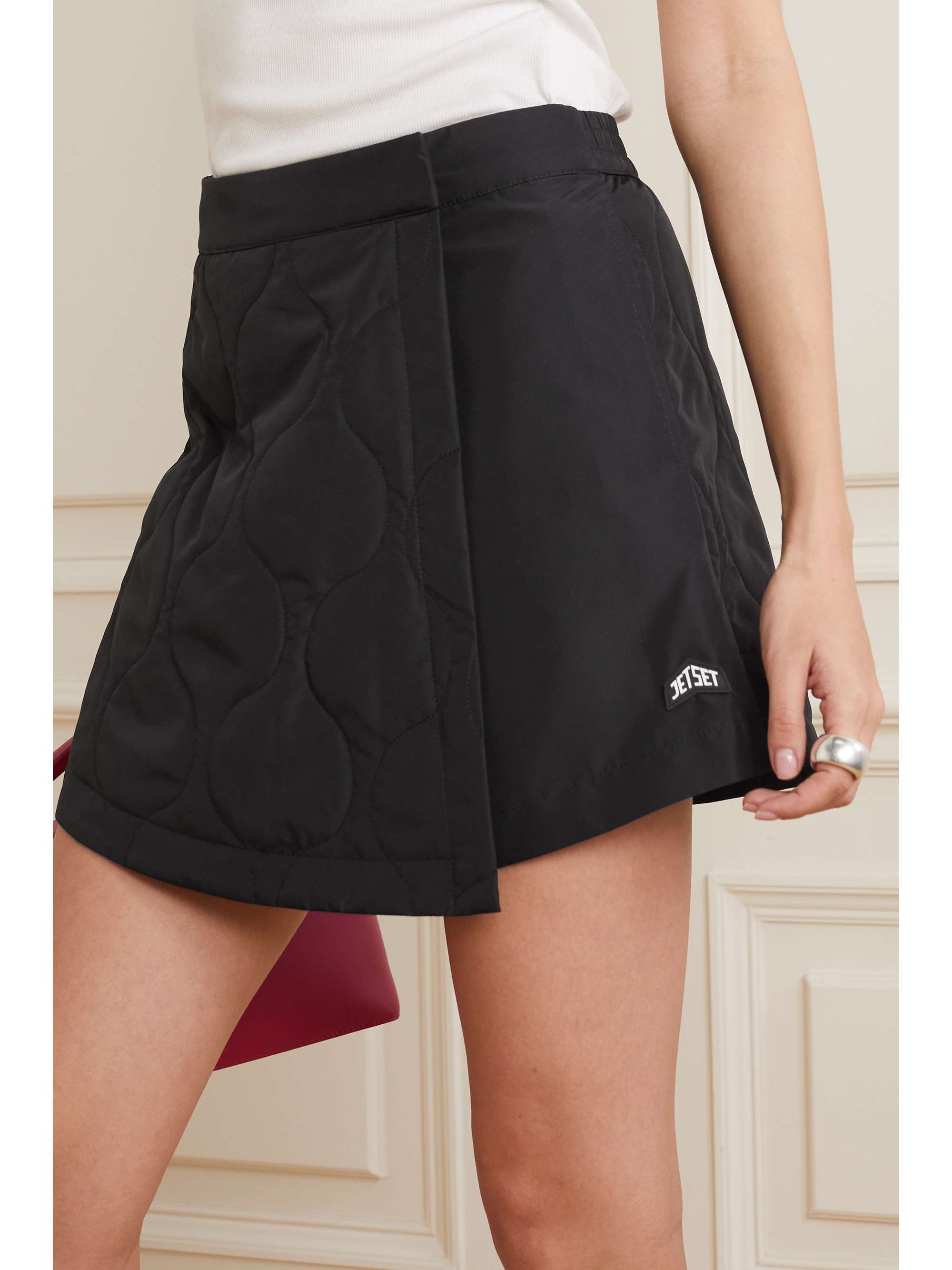 JETSET Bali wrap-effect quilted shell shorts