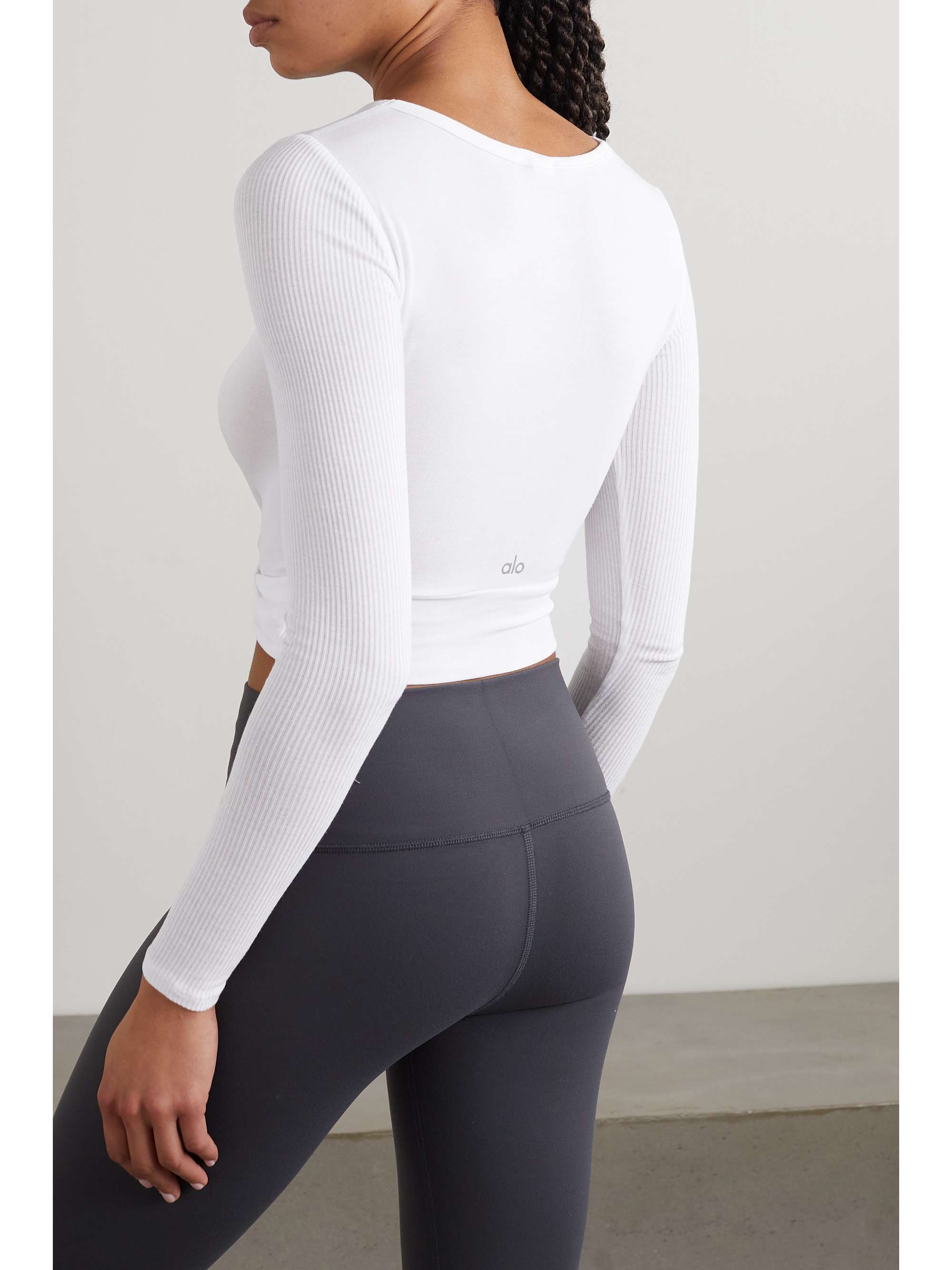 ALO YOGA Haut raccourci en modal stretch à torsade Cover