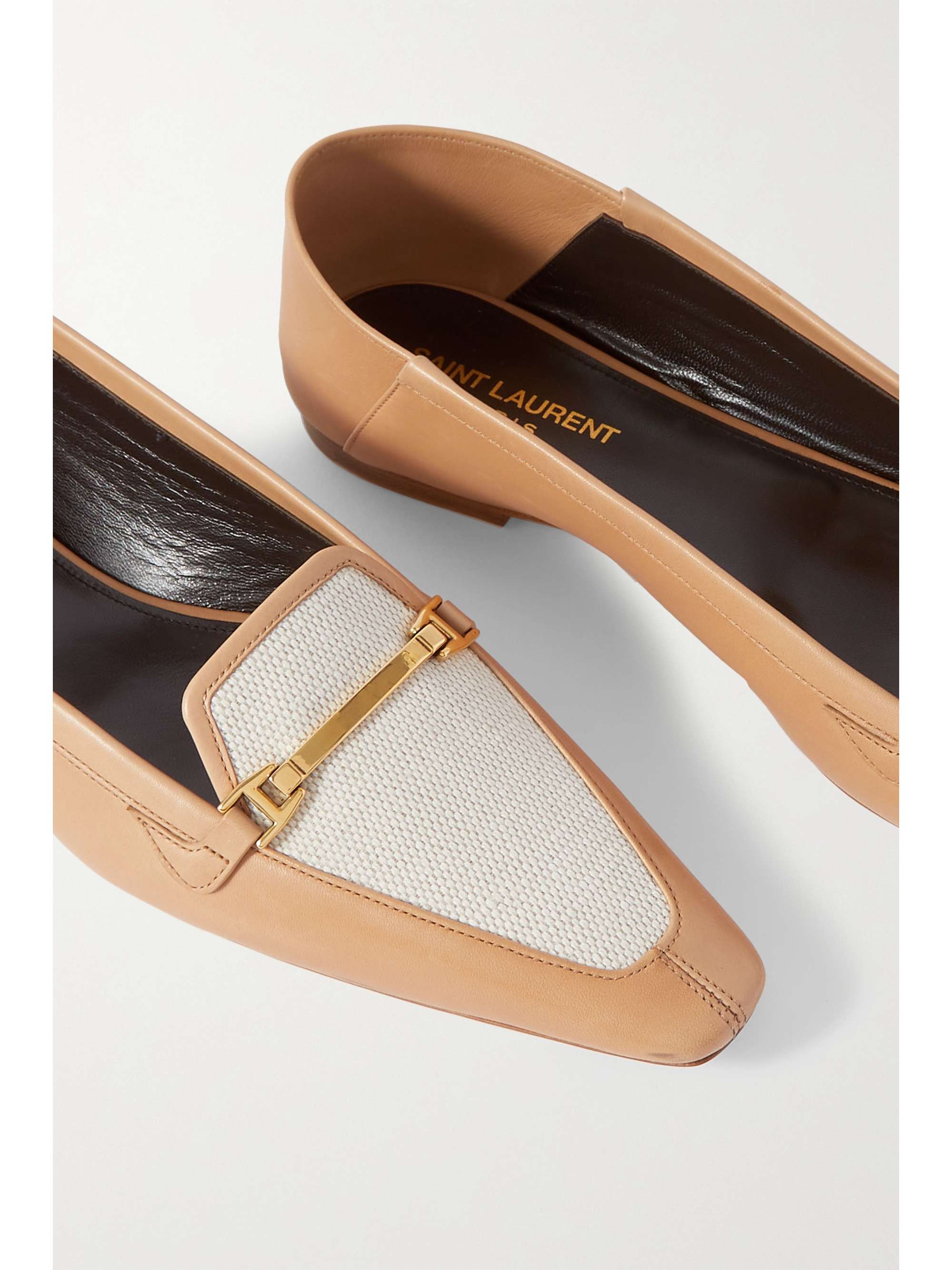 SAINT LAURENT Two-tone embellished leather loafers