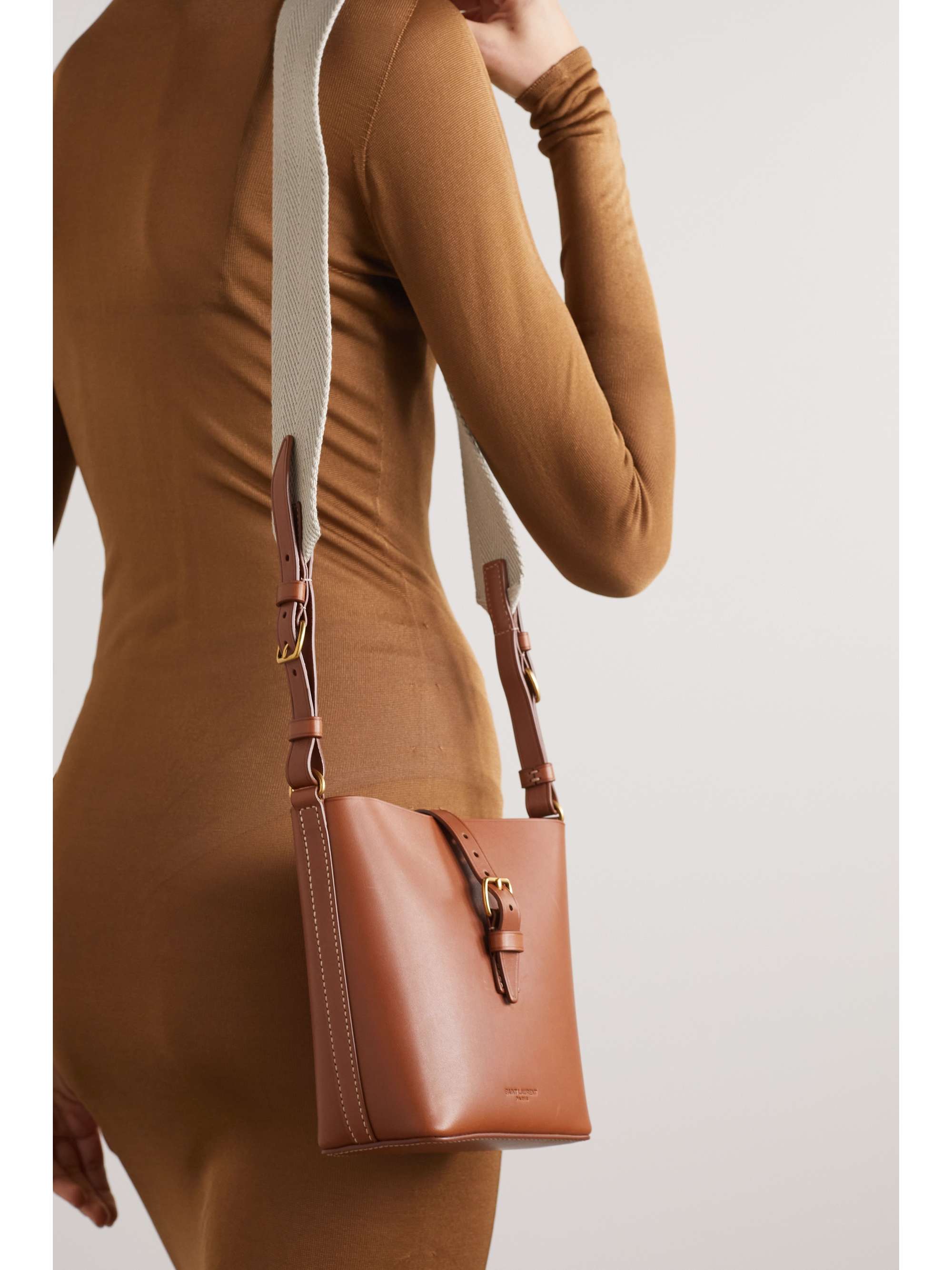 SAINT LAURENT Mini buckled leather bucket bag NETAPORTER