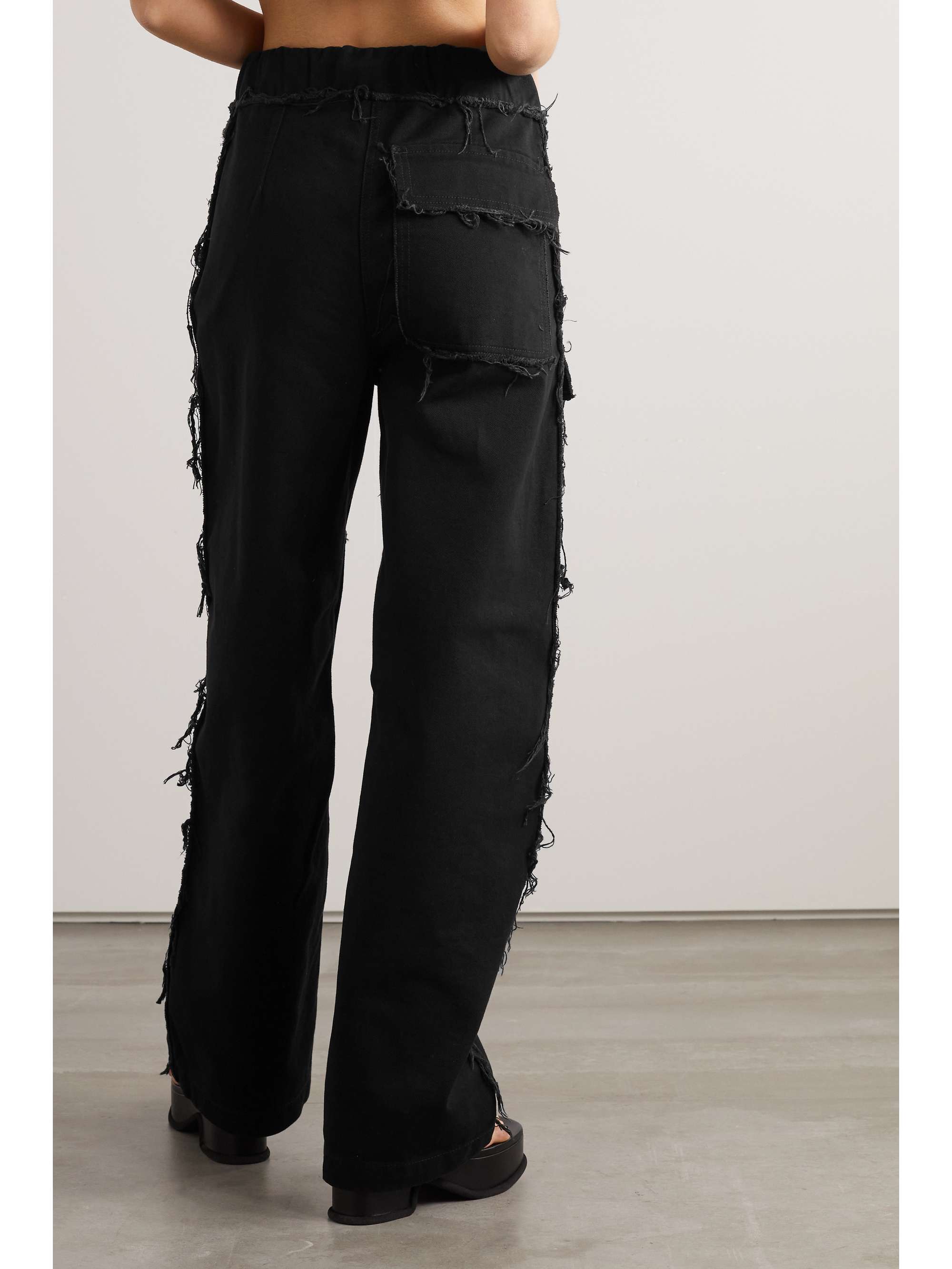 DRIES VAN NOTEN Frayed high-rise wide-leg cargo jeans